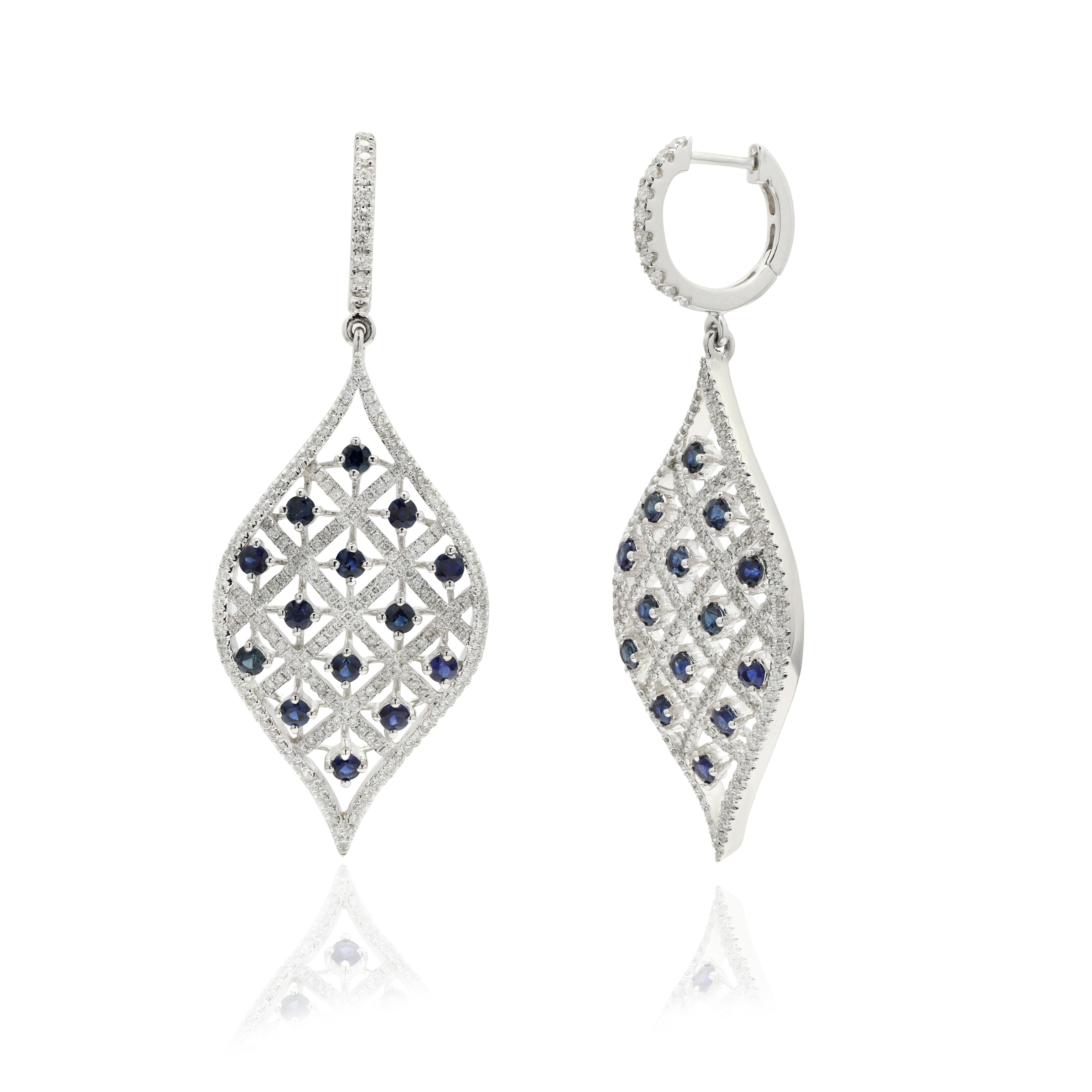 Designer Blue Sapphire and Diamond Long Dangle Earrings to make a statement with your look. These earrings create a sparkling, luxurious look featuring oval cut gemstone.
If you love to gravitate towards unique styles, this piece of jewelry is