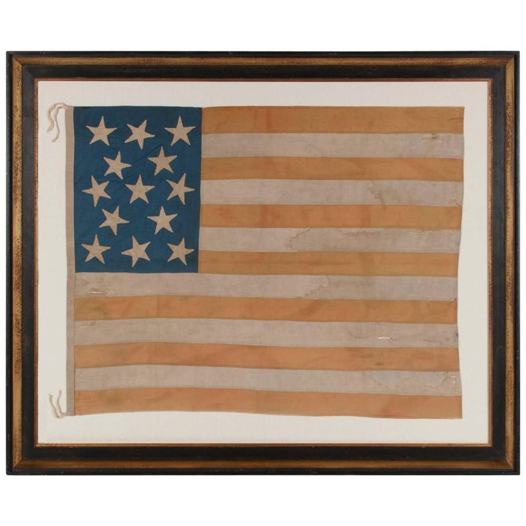 Hand-sewn American flag with 13 stars on a tall canton, 1864–76