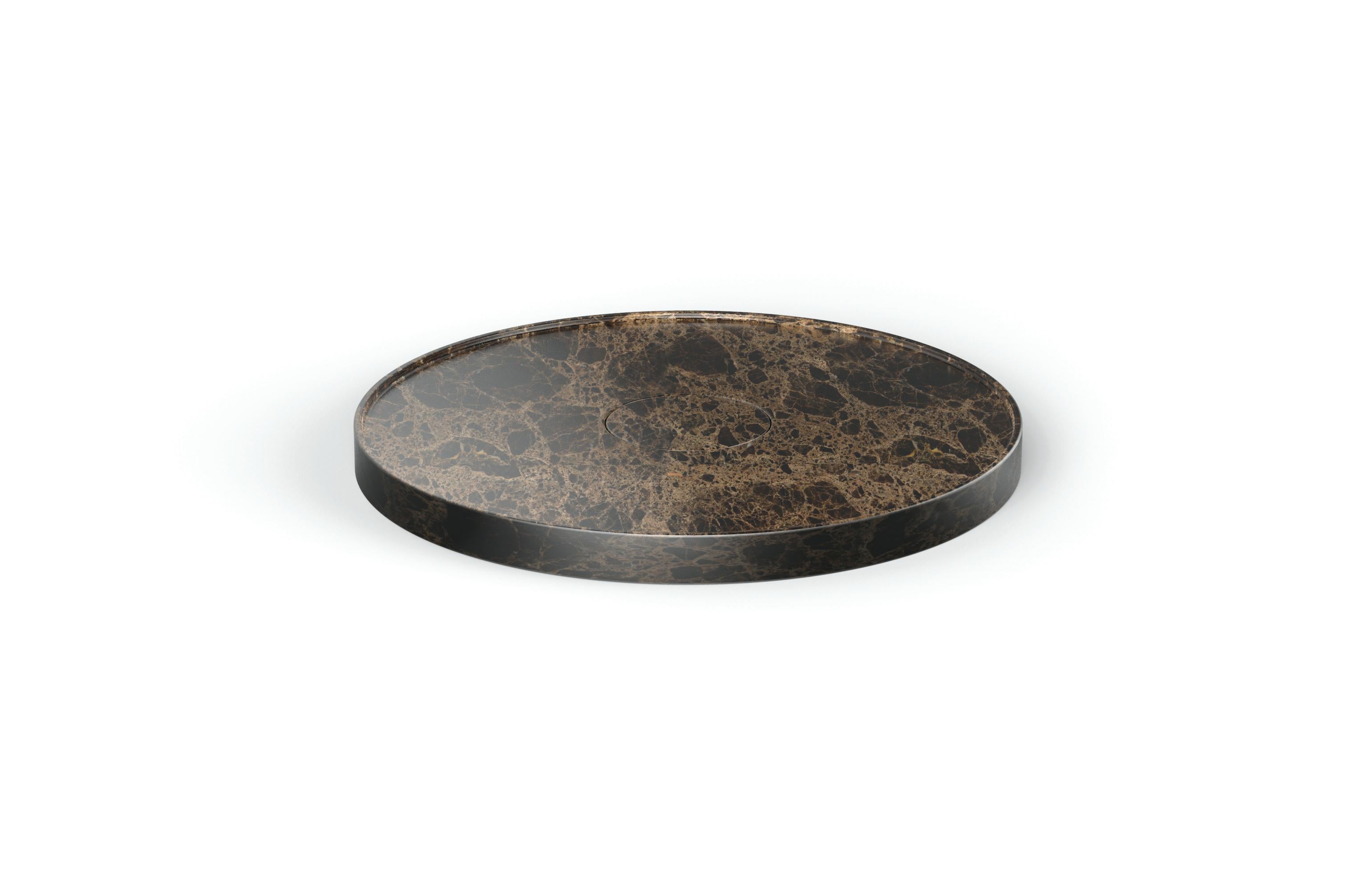 Entity circle shower I by Marmi Serafini
Materials: Emperador Brown marble.
Dimensions: D 80 x H 6 cm
Available in other marbles.

Designed for a free positioning in the room, or to create showers outdoor, has a raised border and restraining