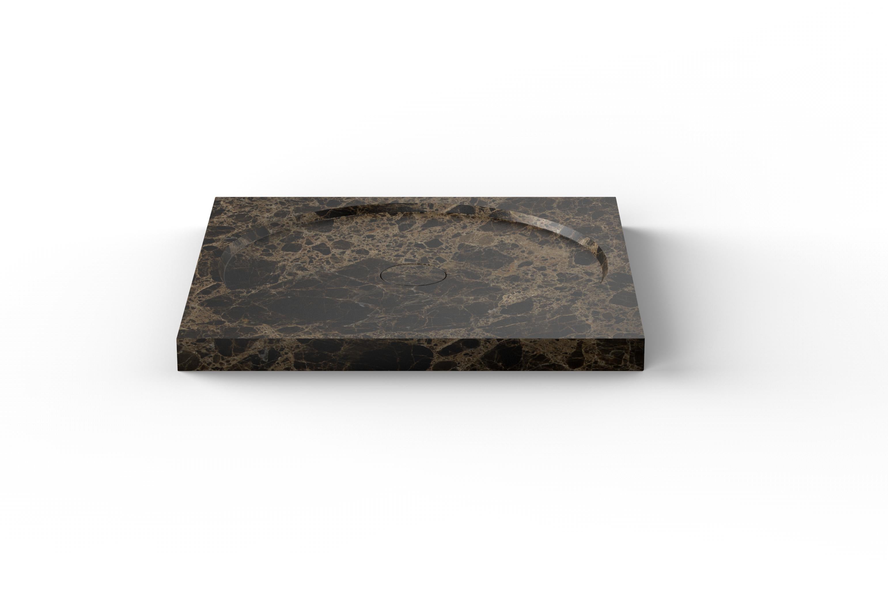 Entity circle shower II by Marmi Serafini
Materials: Emperador brown marble.
Dimensions: D 80 x W 80 x H 6 cm
Available in other marbles.

Can be positioned either in a traditional way by leaning on the floor, or being embedded into the floor.