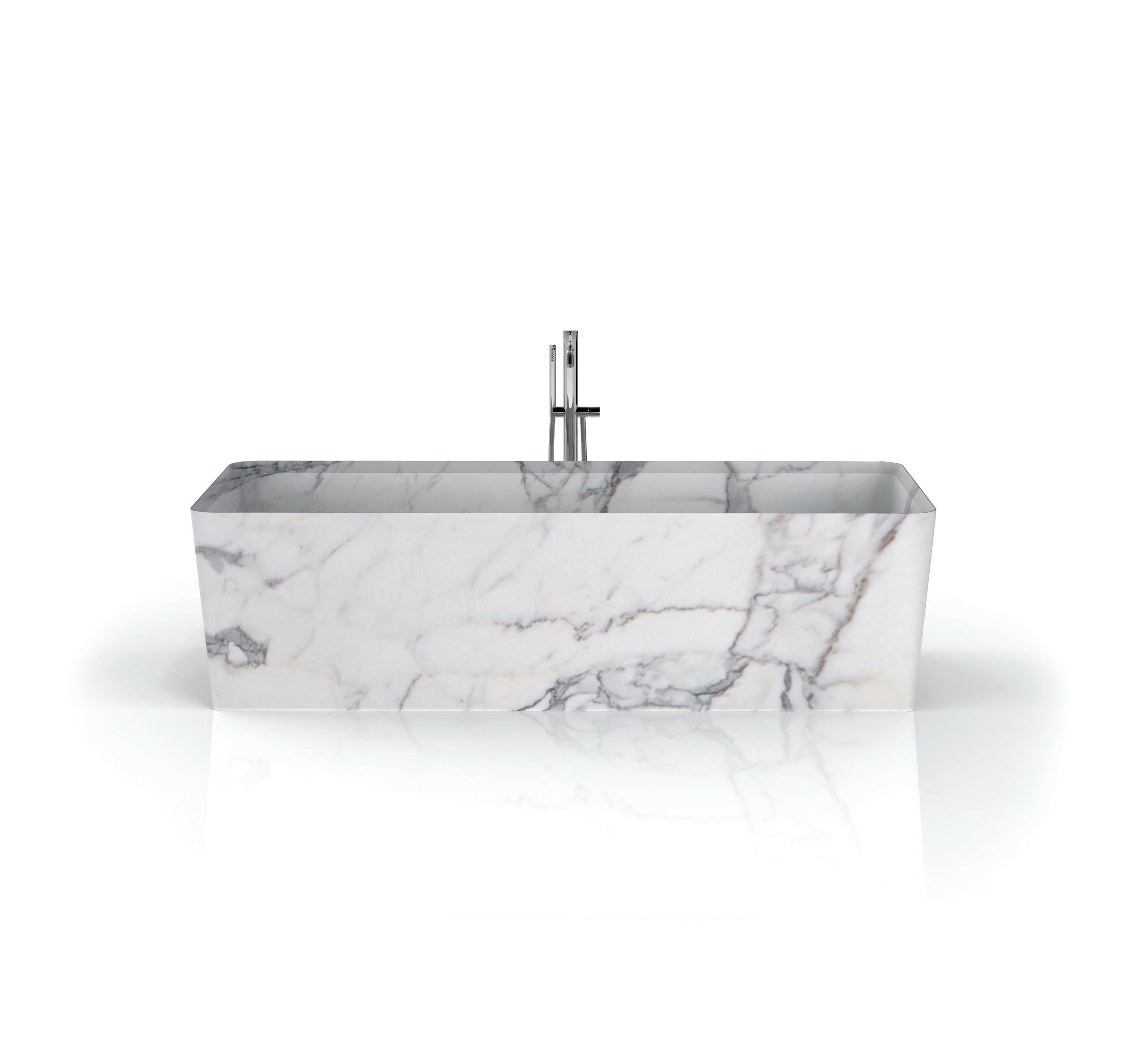 Entity cono bath by Marmi Serafini.
Materials: Statuarietto marble.
Dimensions: D 80 x W 180 x H 50 cm.
Available in other marbles.
Tap not included.

Simple and slender lines, rounded and soft boards, subtle e and elegant edges: a solid
