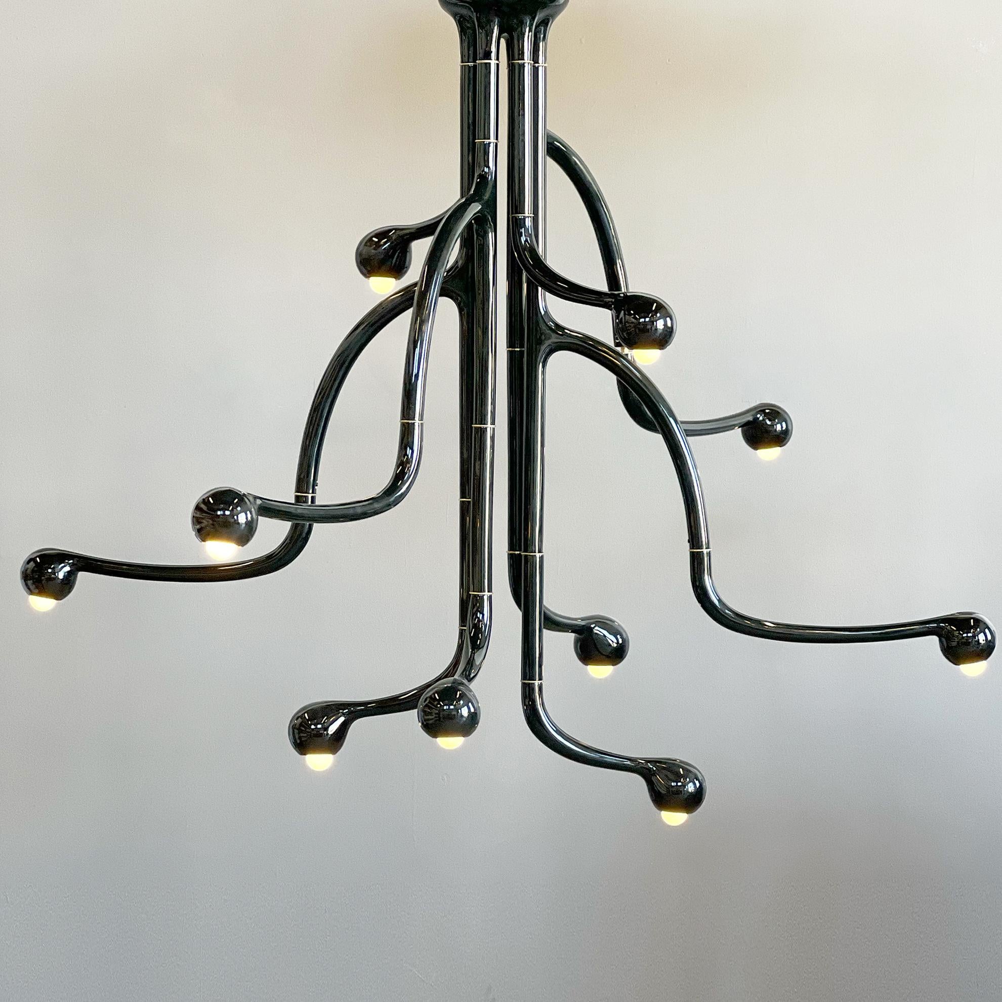 The ENTLER 10-globe chandelier is made-to-order in any of our 25 ceramic glazed finishes. 

Founded in 2015 by Jonathan Entler, the Los Angeles based studio produces table lamps that are meticulously handcrafted by a small team of talented artisans,