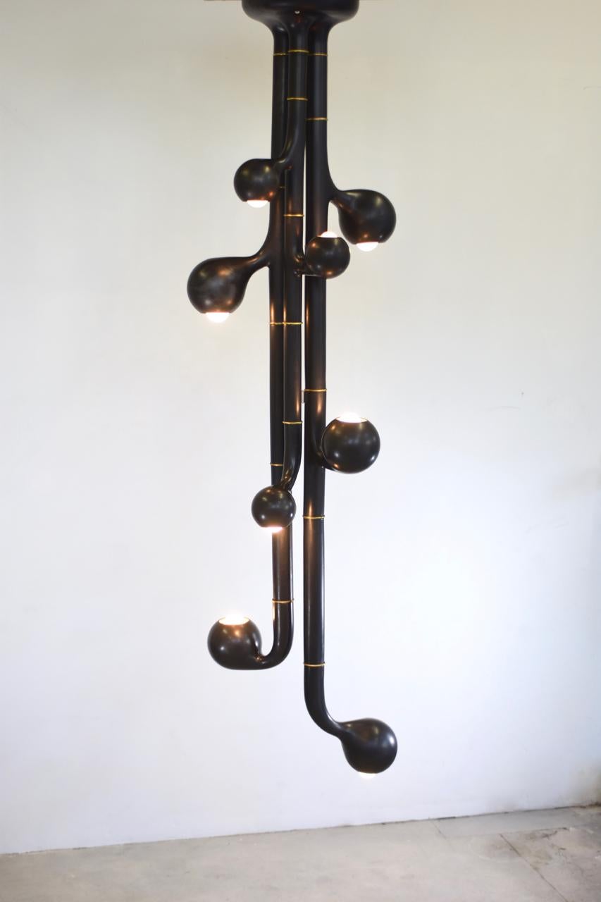 Entler ceramic chandelier. 

Entler lamps have grown! The newest chandeliers have scaled up and use 6