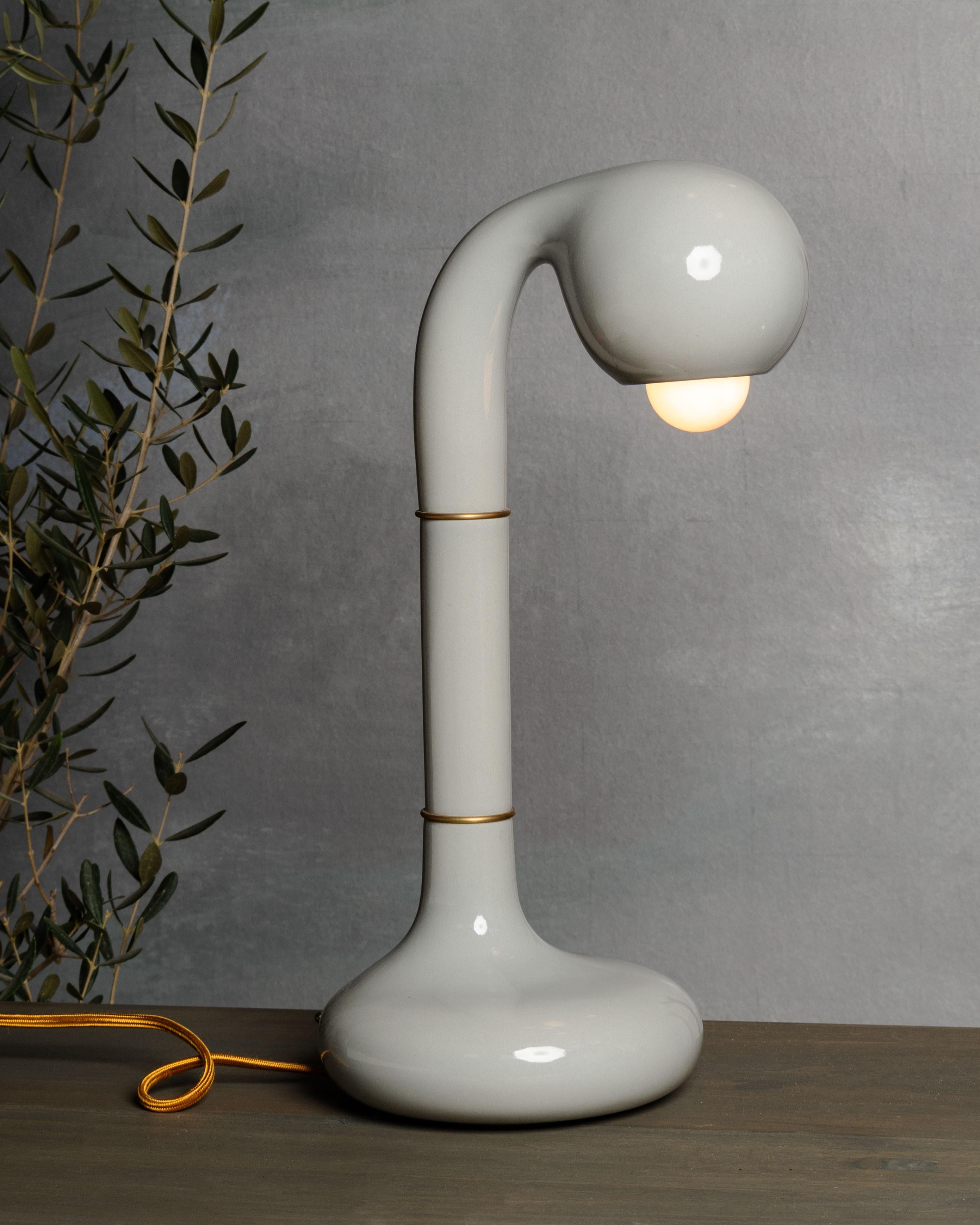 The Entler Floor Lamp. Cast in ceramic stoneware, then carefully glazed and fired in any of our twenty-five signature finishes. The modular design allows for endless customization and versatility - a perfect fit for any space. These playful