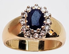 Entourage Ring 585 Gold 1 Sapphire and 12 Brilliant-Cut Diamonds