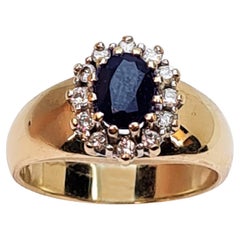 Entourage Ring 585 Gold 1 Sapphire and 12 Brilliant-Cut Diamonds