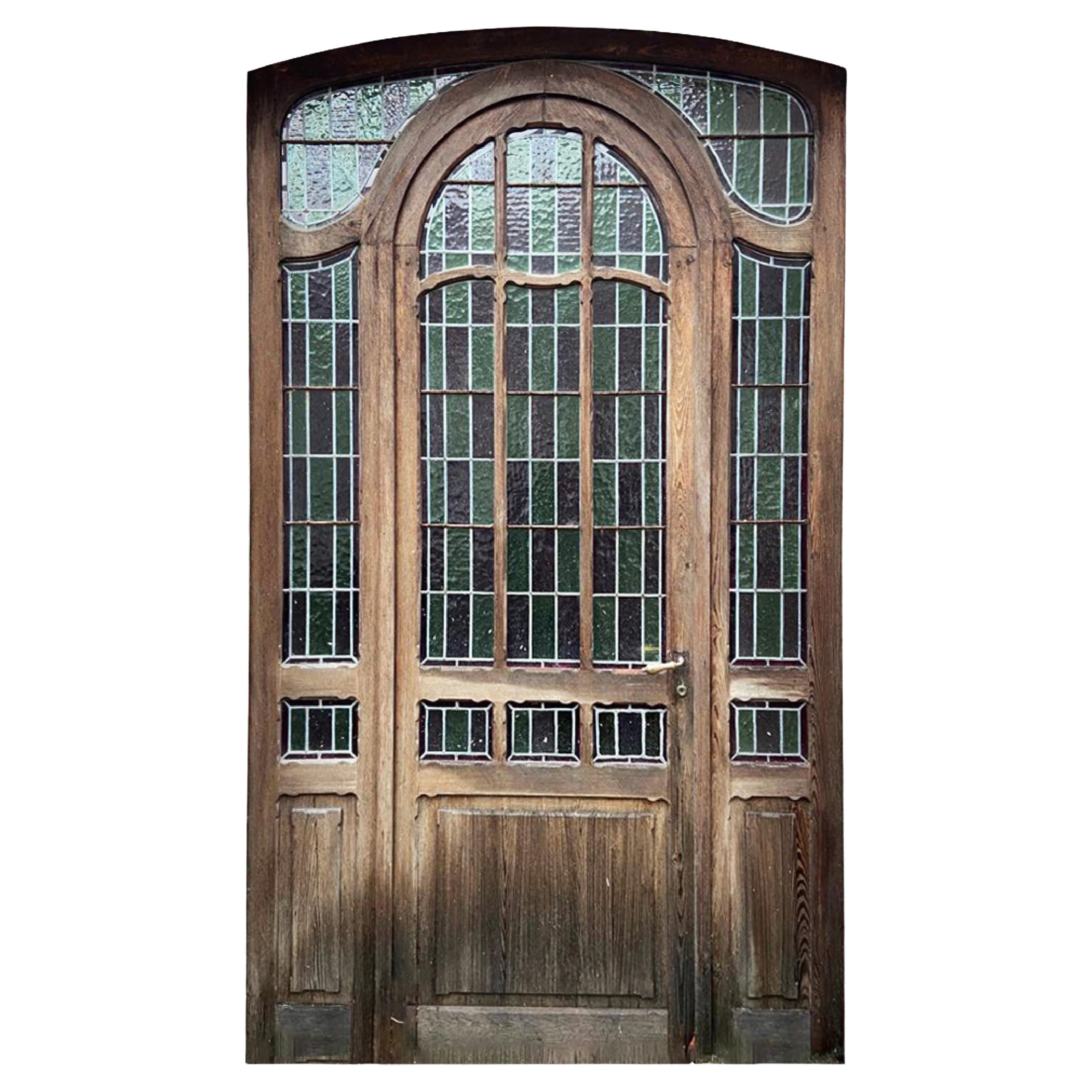 Entrance door and its stained glass surround For Sale