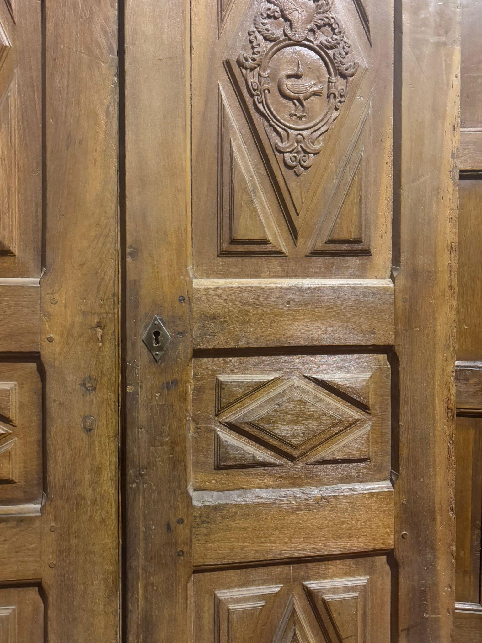 Hand-Carved Entrance door in walnut, with two doors and carved panels, Italy For Sale