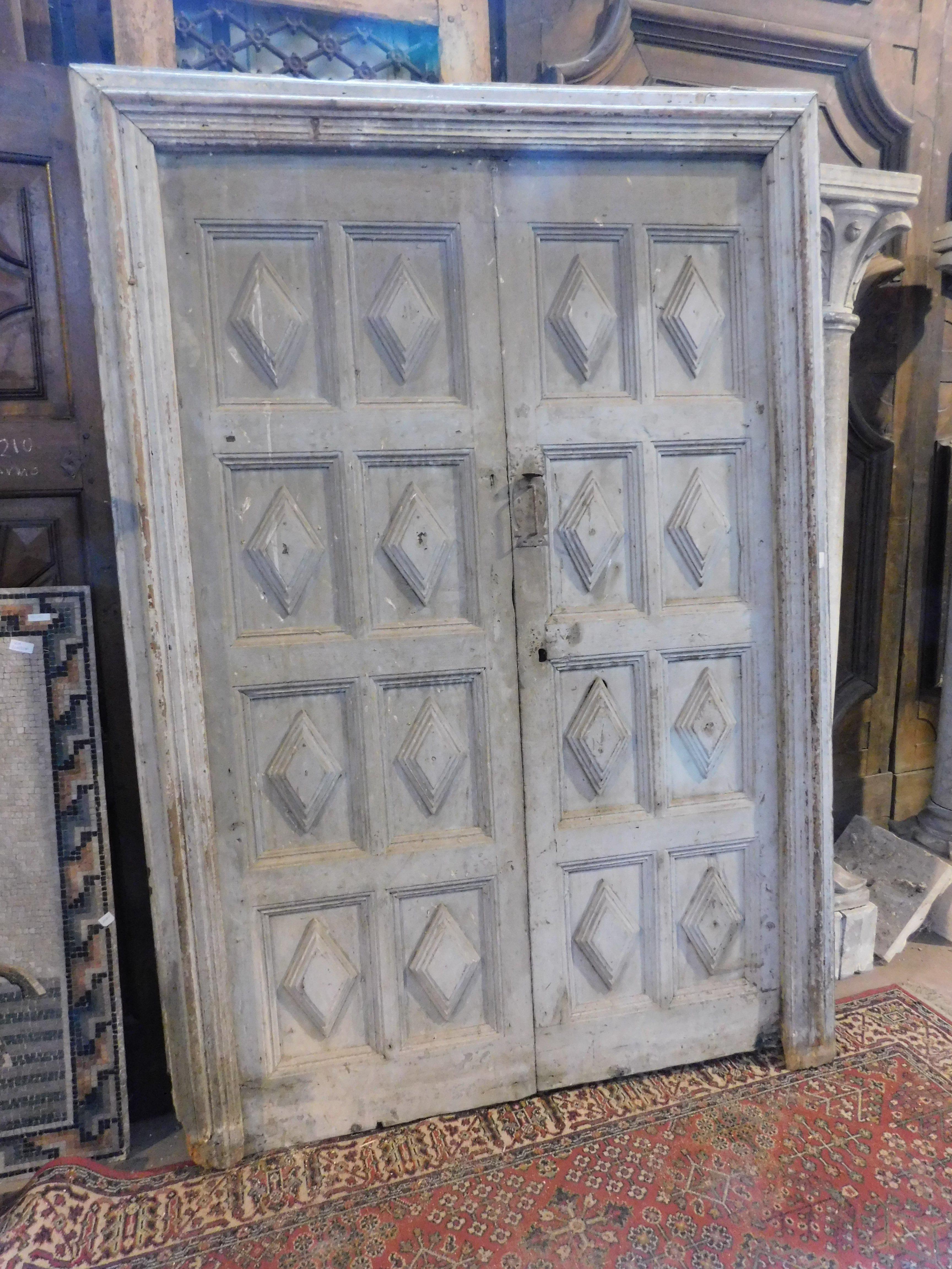 Ancient entrance door, main door that can also be used internally, lacquered and carved with lozenges, original and complete with frame, from Spain, built in the 18th century, double-leaf with smooth lacquered back, maximum size with frame 146 cm w