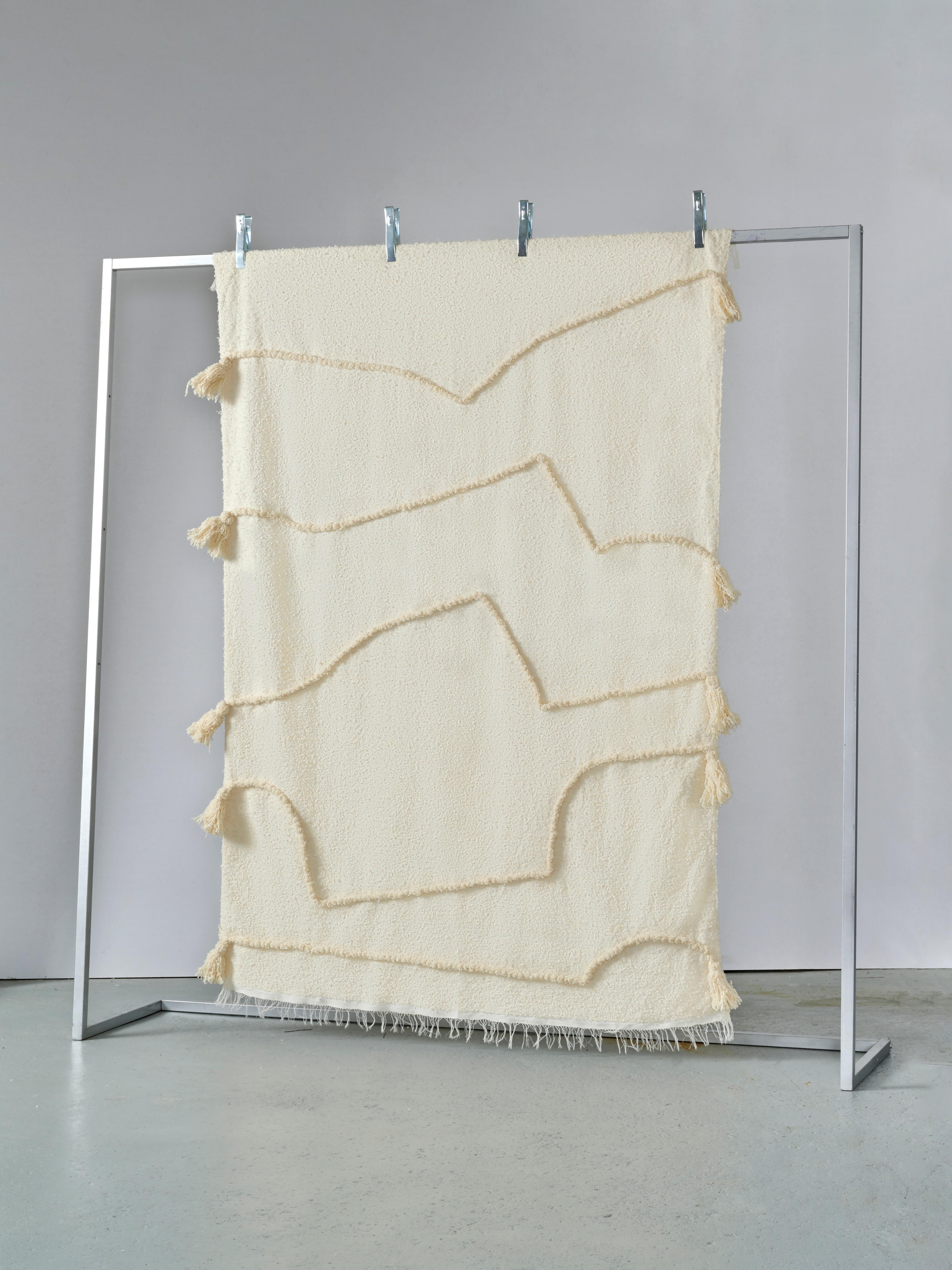 The Entwine collection of blankets and rugs by Maria Jeglinska shows a more random application of colors and lines, the poetic of the grid is still there but the design is moving towards its decomposition. The cross-cultural contamination is