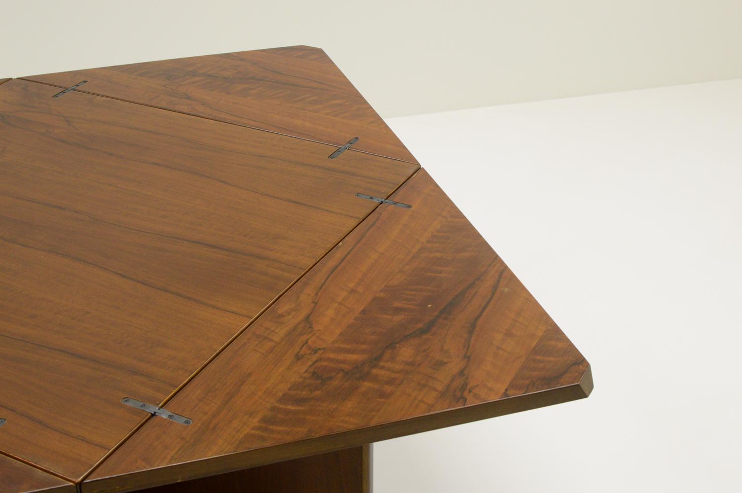 Walnut Envelope dining table by vittorio Introini for Sormani, 1960s Italy. For Sale