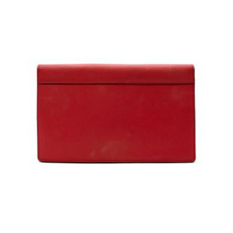 Celine Envelope Red Suede and Leather Clutch Bag
 
 
 
 - Supple leather, rectangular body
 
 - Suede panels 
 
 - Silver tone push clasp fastening 
 
 - Fully lined with burgundy suede 
 
 - Two interior compartments
 
 - One interior zip pocket
 
