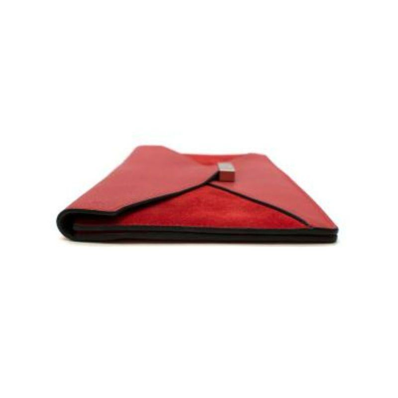 red suede clutch bag