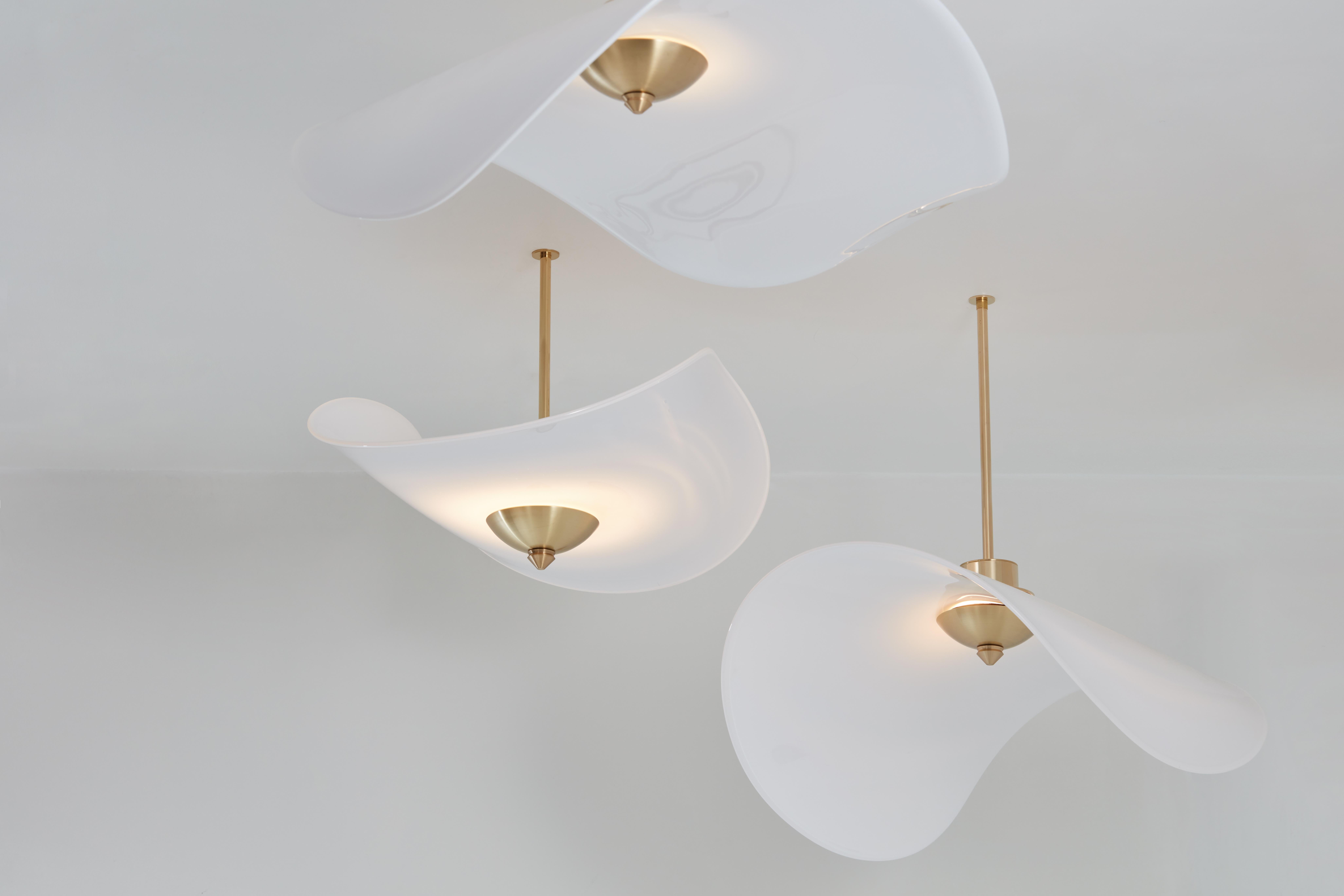Envoleé glass pendant lamp by Mydriaz
Dimensions: D 45 x W 59 x H 11.5 cm
Materials: Opaline glass, pale gold polished brass.
10kg

Our products are handmade in our workshop. Dimensions and finishes may vary slightly from one model to another
