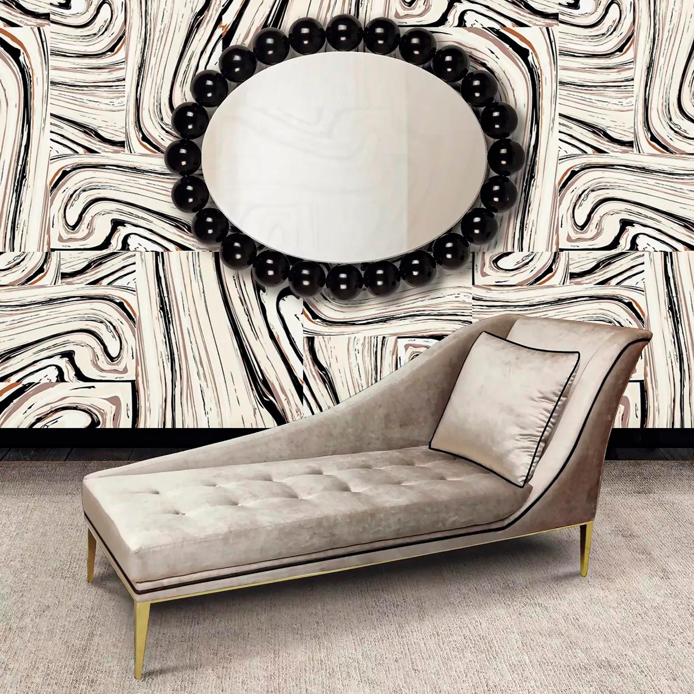 Designed with a seductress in mind the Envy Chaise will ignite your air with luxury design. Fully upholstered in lux upholstery fabric with a tailored cushion. This irresistible chaise is accented with soft button tufting. A chic metal band wraps