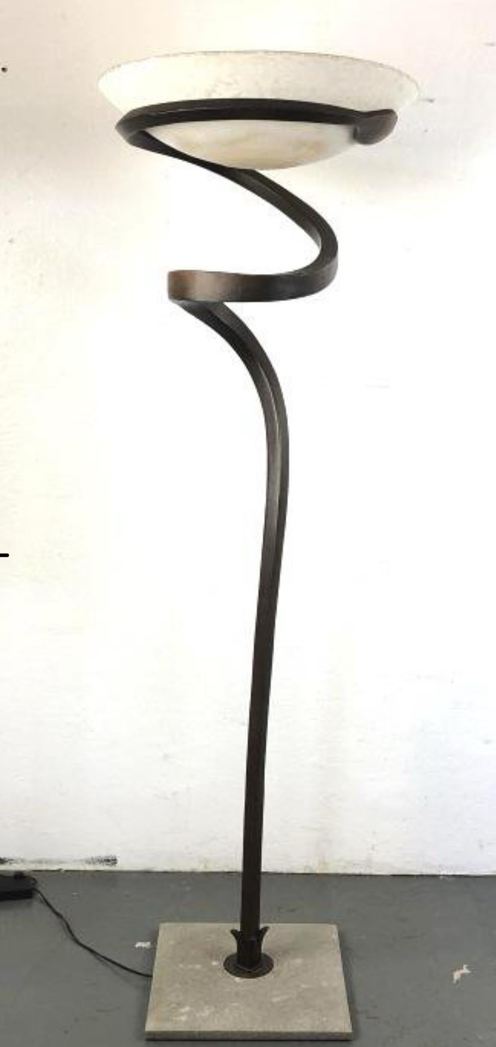 Sinuous floor lamp in cast copper with Murano scavo glass bowl shaped shade designed by Enzo Ciampalini and manufactured by Lamp International, Italy. Cast stone base in a square form with ogee edge. Rewired and ready to be placed. 
From Lamp