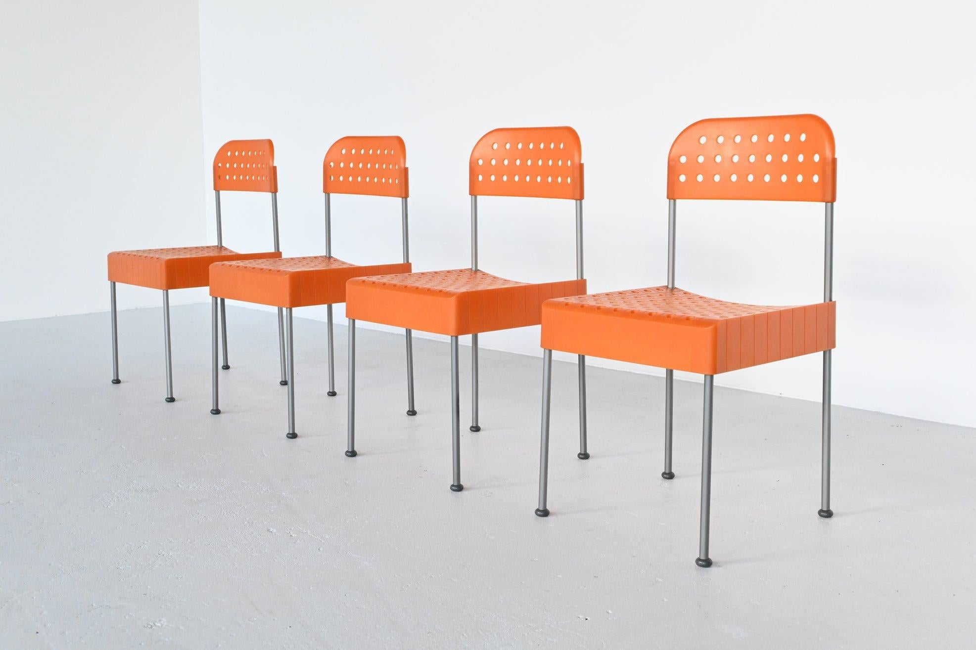 Very nice set of 4 orange box chairs designed by Enzo Mari and manufactured by Aleph Atlantide (Driade), Italy 1970. This chair is a good example of a rational design, the components can be easily dismantled and packed into a flat box as big as the