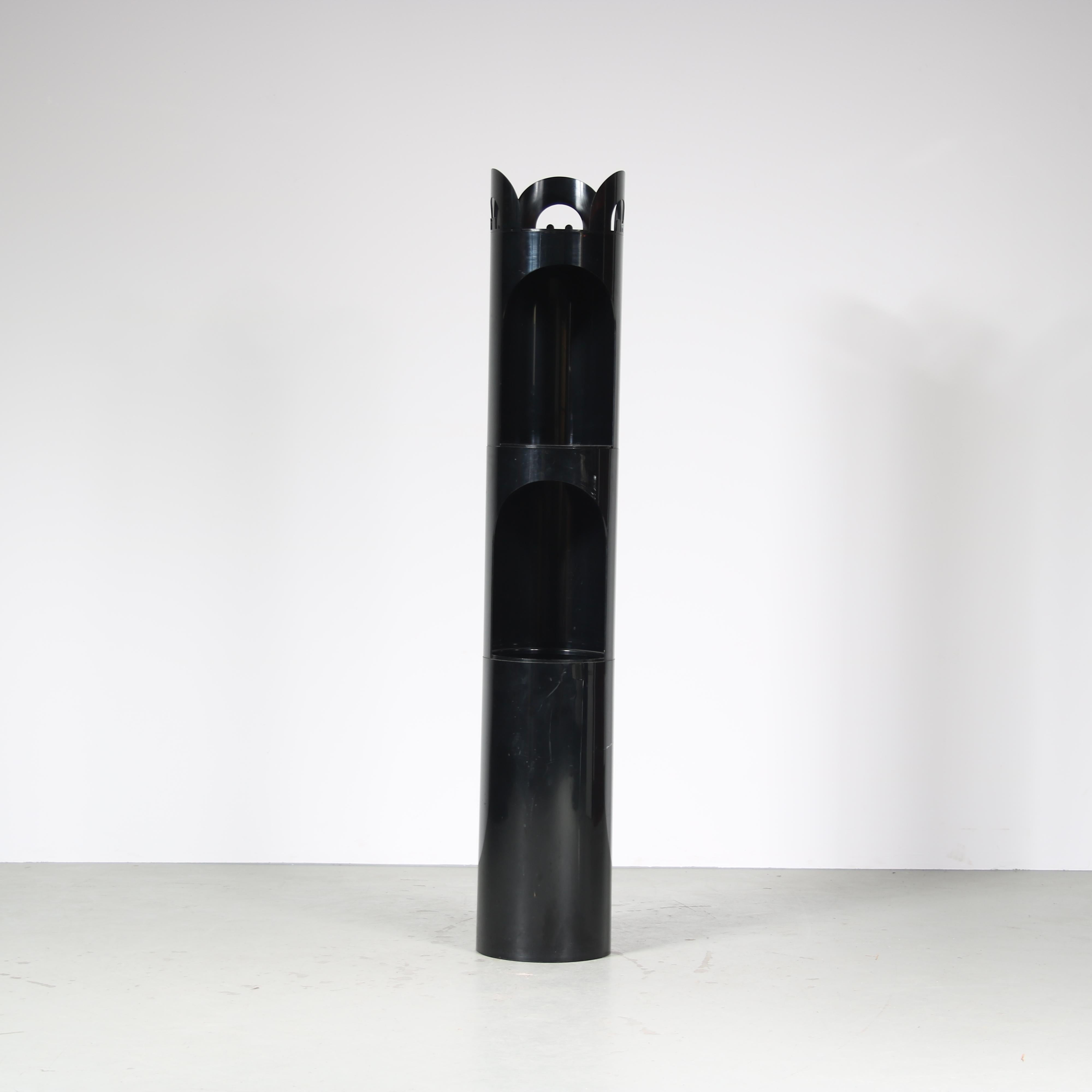 Beautiful coat rack with umbrella stand and storage tray designed by Enzo Mari, manufactured by Danese, Italy in 1968.

This original piece is completely made of black plastic with a strong concrete base, providing extra stability. It is uniquely