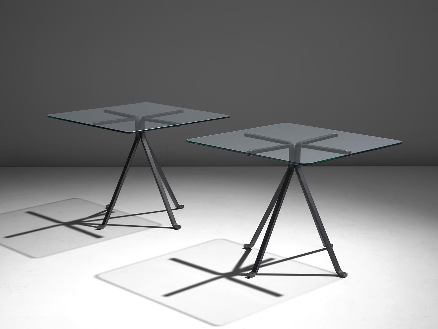 Enzo Mari for Driade, 'Cuginetto' side tables, glass, painted steel, Italy, 1970s.

This set of coffee tables 'Cuginetto' are designed by Enzo Mari (1932-2020) and manufactured by Driade. They feature a black steel base out of four apart legs which