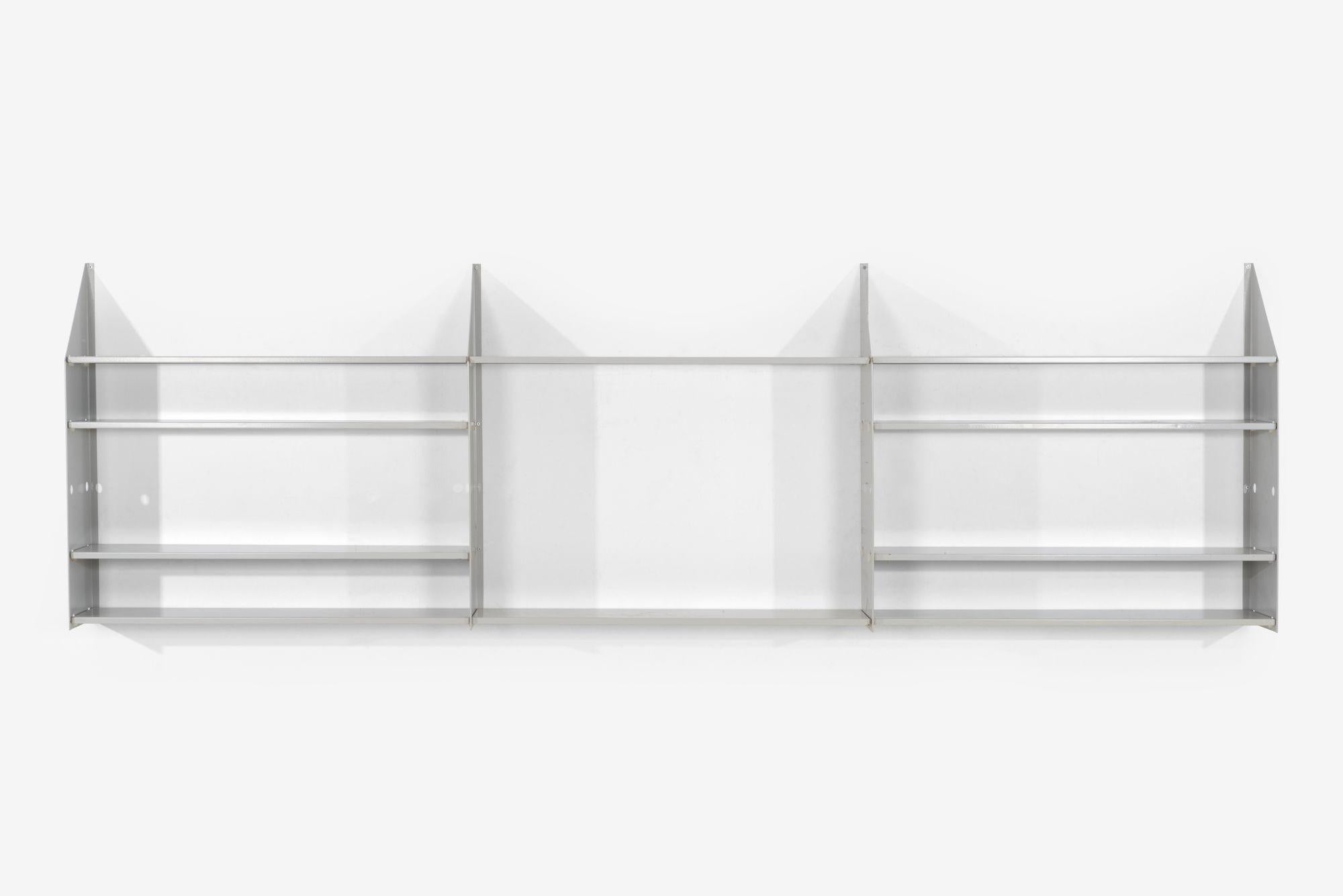 Enzo Mari dima modular wall shelving system for Simon International Dima Italy, circa 1970
Enameled steel, shelves adjustable with solid plastic holders.

Measures : Each individule shelve: 36 1/4
