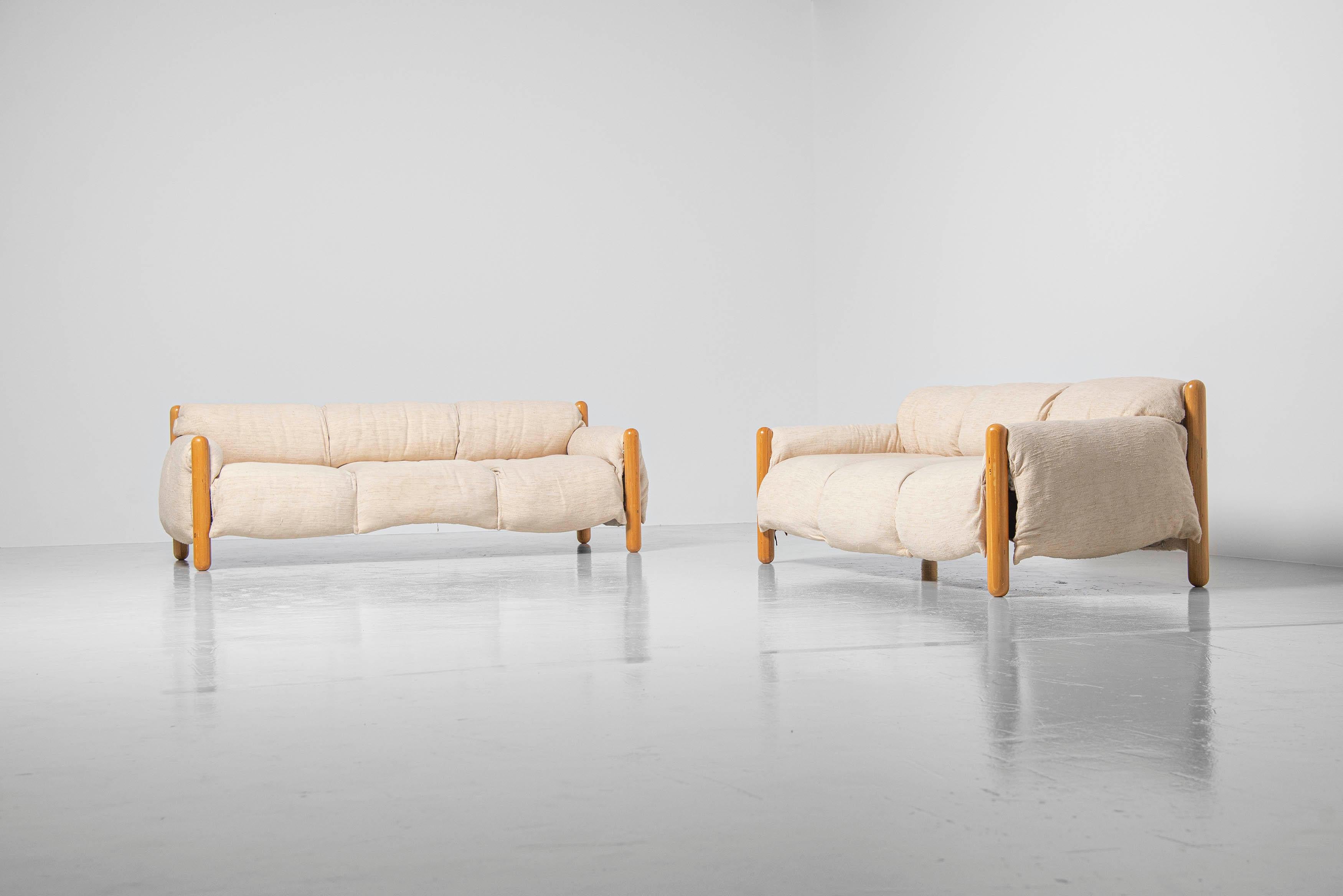 Playful and cosy Gambadilegno sofa's designed by Enzo Mari and manufactured by Driade, Italy 1974. These sofa's were made in very small production only and makes these very difficult to find. These sofa's were always together in a pair and have
