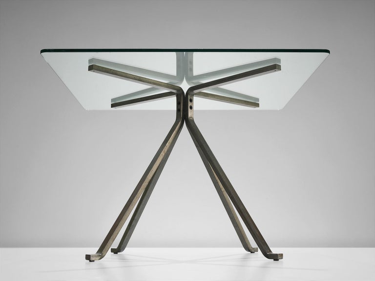 Enzo Mari for Driade, table, glass and painted steel, Italy, 1970s.

This table is designed by Enzo Mari and manufactured by Driade. It features a black anthracite painted steel sections structure with tempered square glass top. The table has a