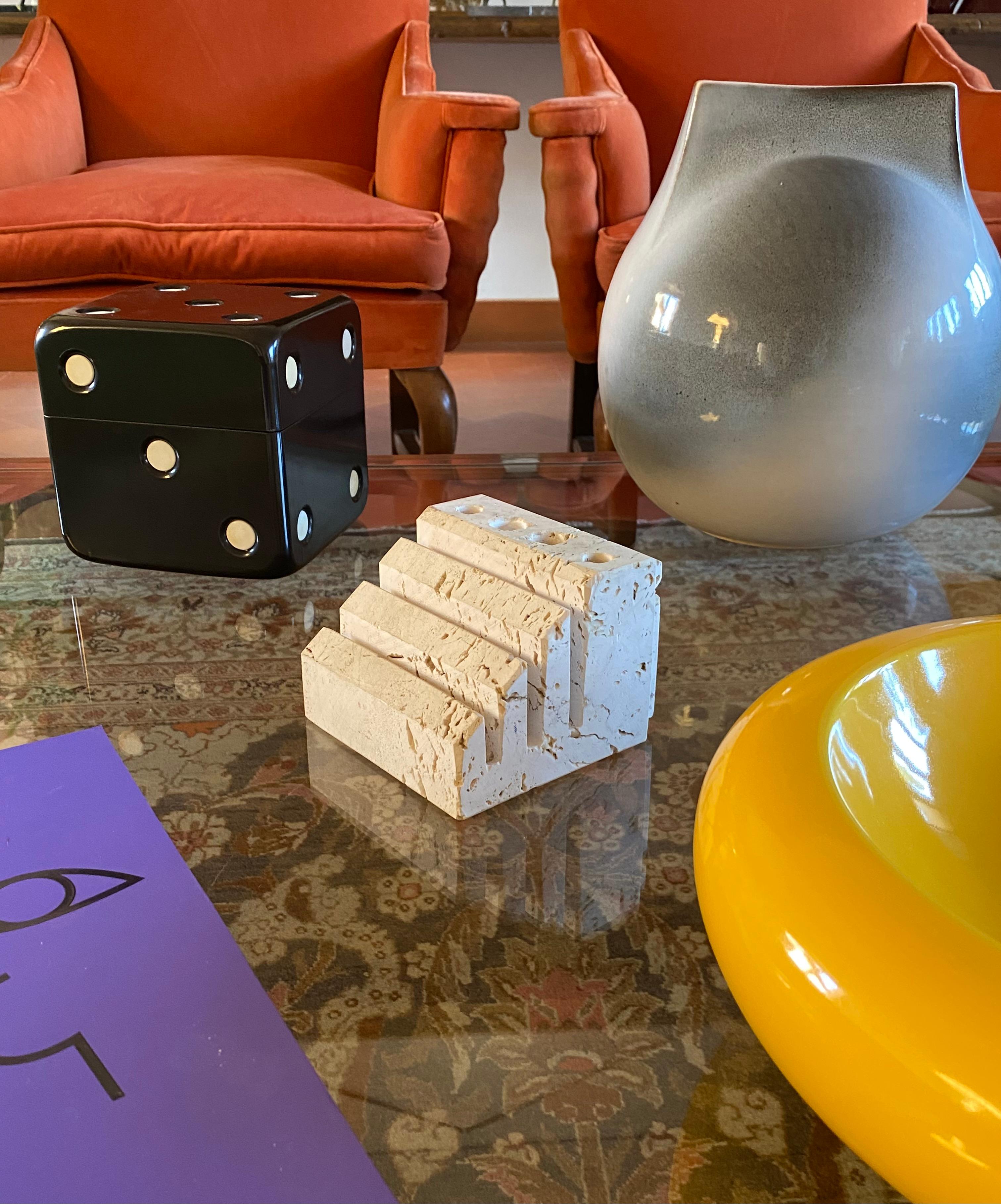 Travertine desk organizer

Enzo Mari, Fratelli Mannelli, Italy, 1970s.

H 10 cm - 13 × 14.5 cm.

Conditions: good condition consistent with age and use. Defects.