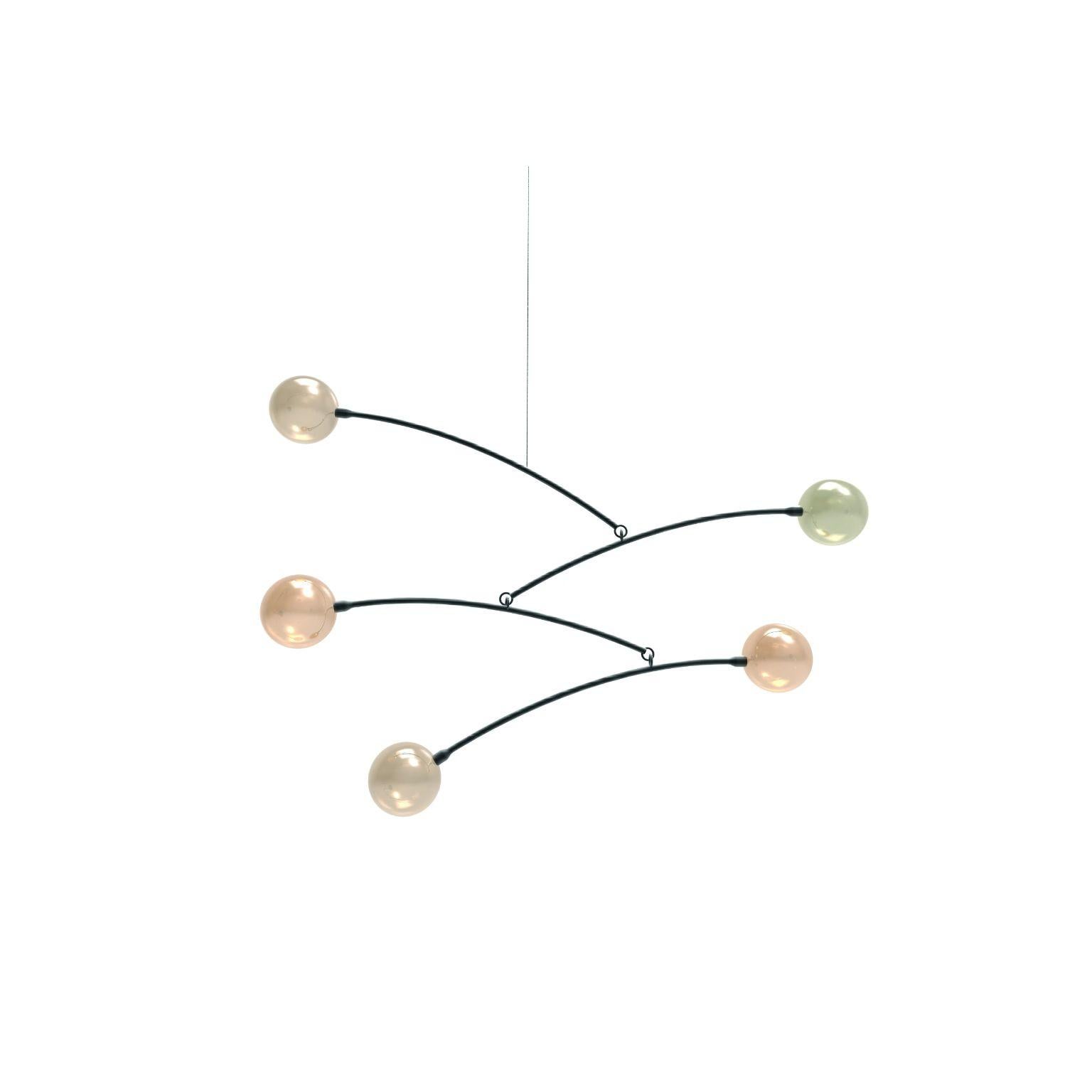 Eole lighting fixture #5 by Emilie Lemardeley
Dimensions: D100 x W20 x H70 cm
Materials: Black steel, hand blown glass
Weight: 8 kg

The lighting fixtures in the Eole collection are mobiles and move according to the wind and movements in the