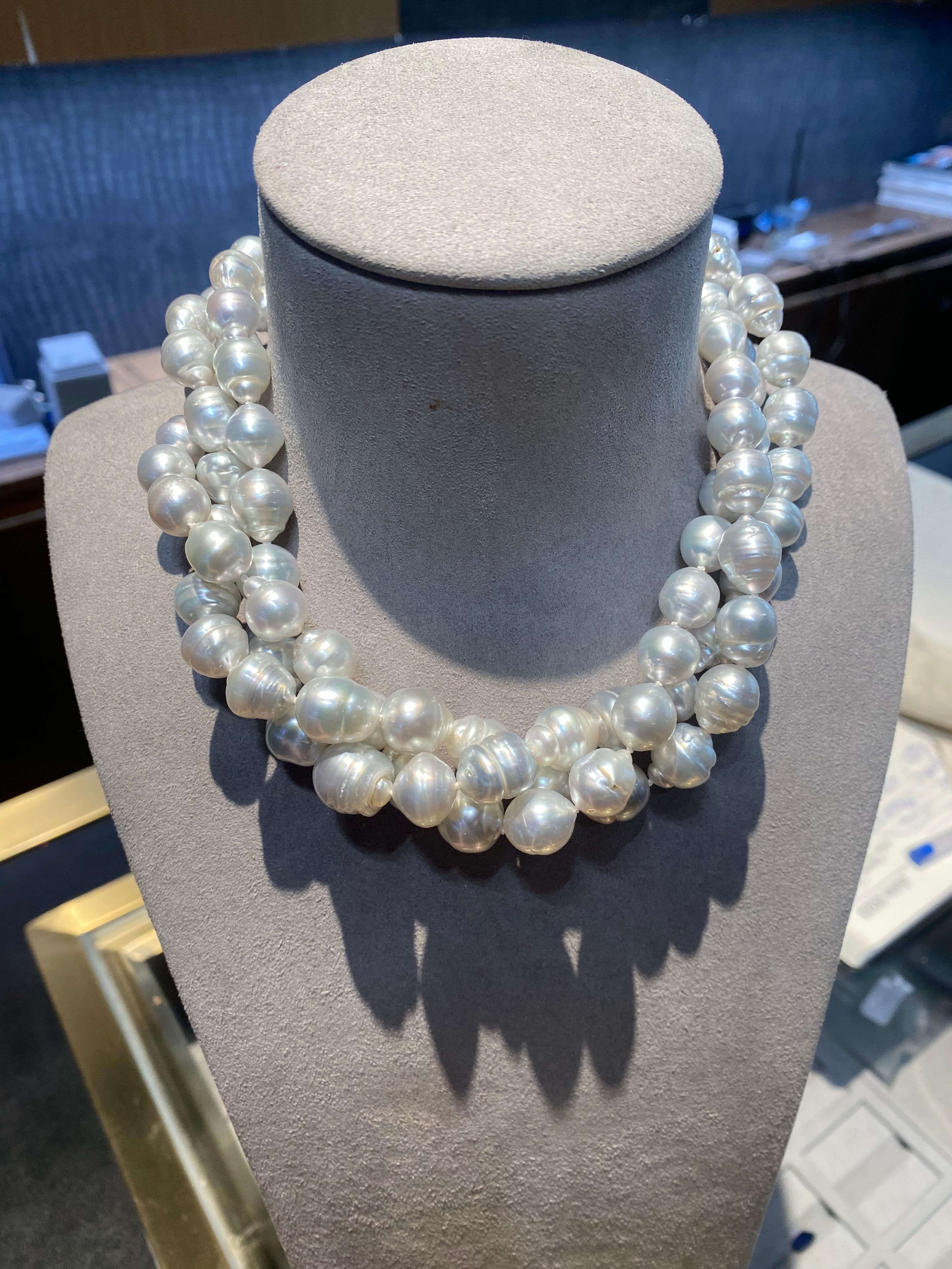 A Strand of white Colour pink tone Australian South Sea pearl necklace with 18K Gold Clasp. Pink tone is very sought after in south sea pearls and therefore more valuable. 

A 9 mm to 13 mm silver Colour pink tone south sea Pearl Necklace. It is a