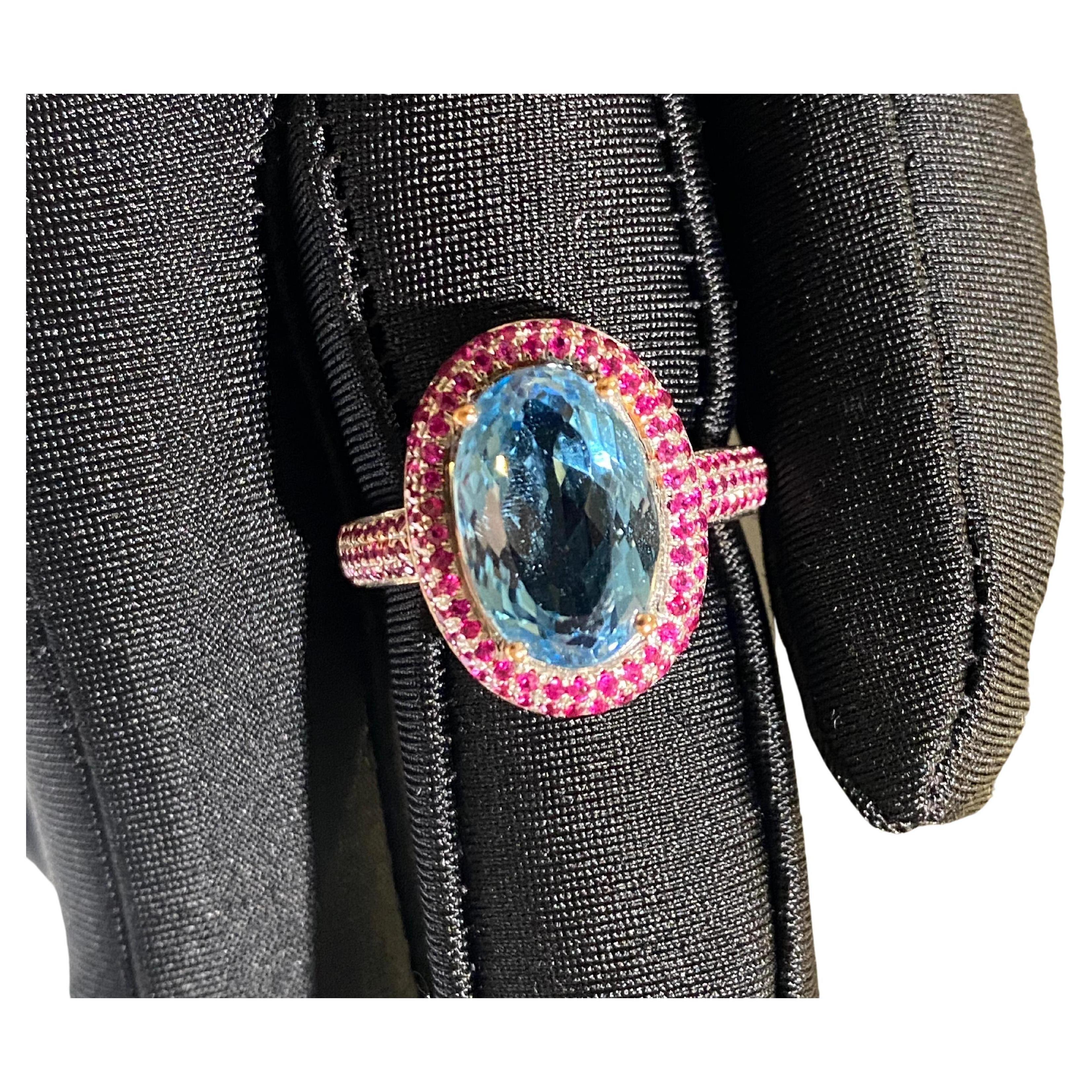 Contemporary Eostre Aquamarine and Ruby Ring in 18k Rose Gold For Sale