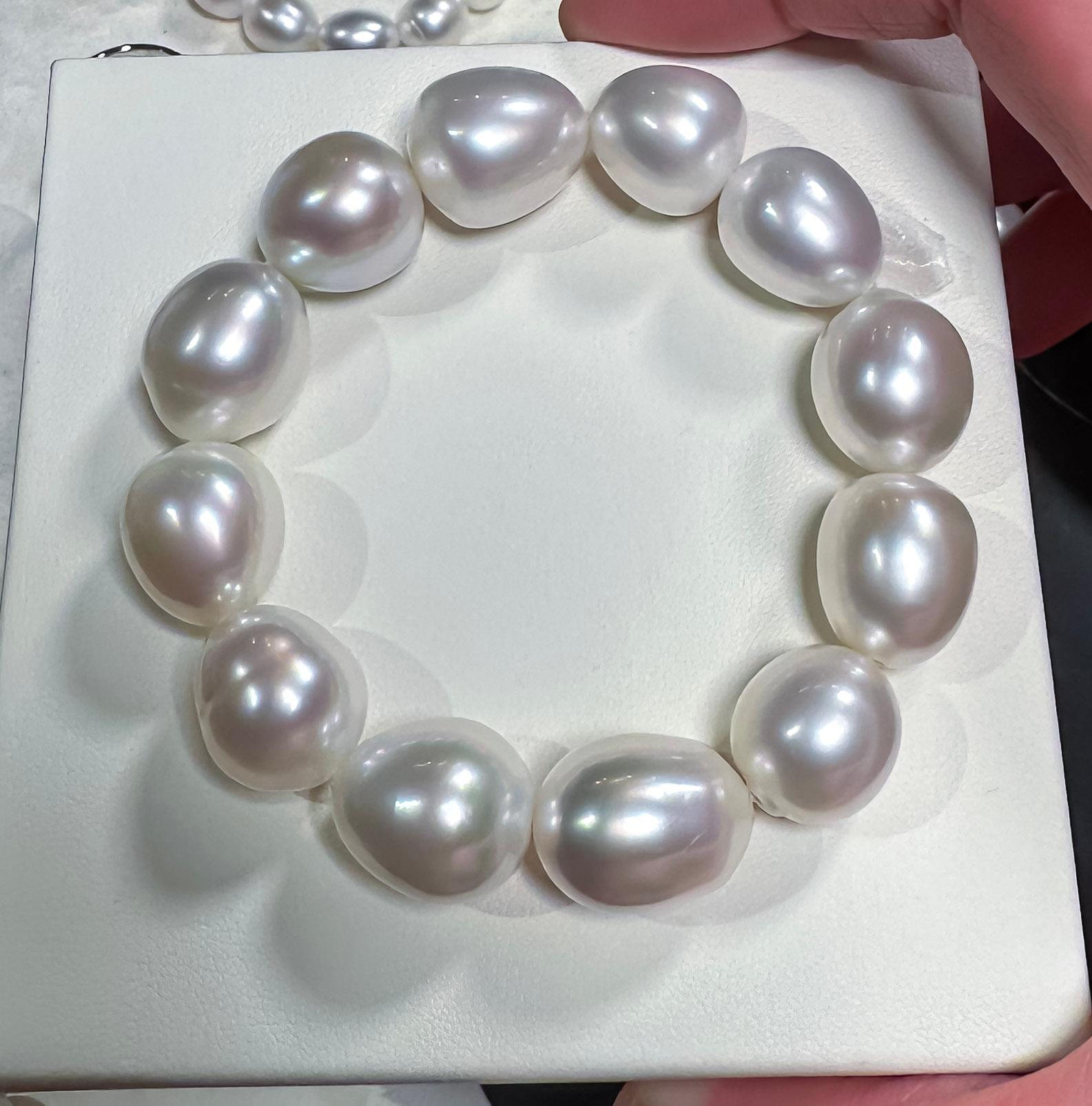 A white Australian South Sea Pearl Bracelet 

It consists of 12 cultured south sea pearls in white Colour with pink overtone. The Pearls are of High Lustre. white body colour with pink and green overtone. it is one of the best colour in south sea