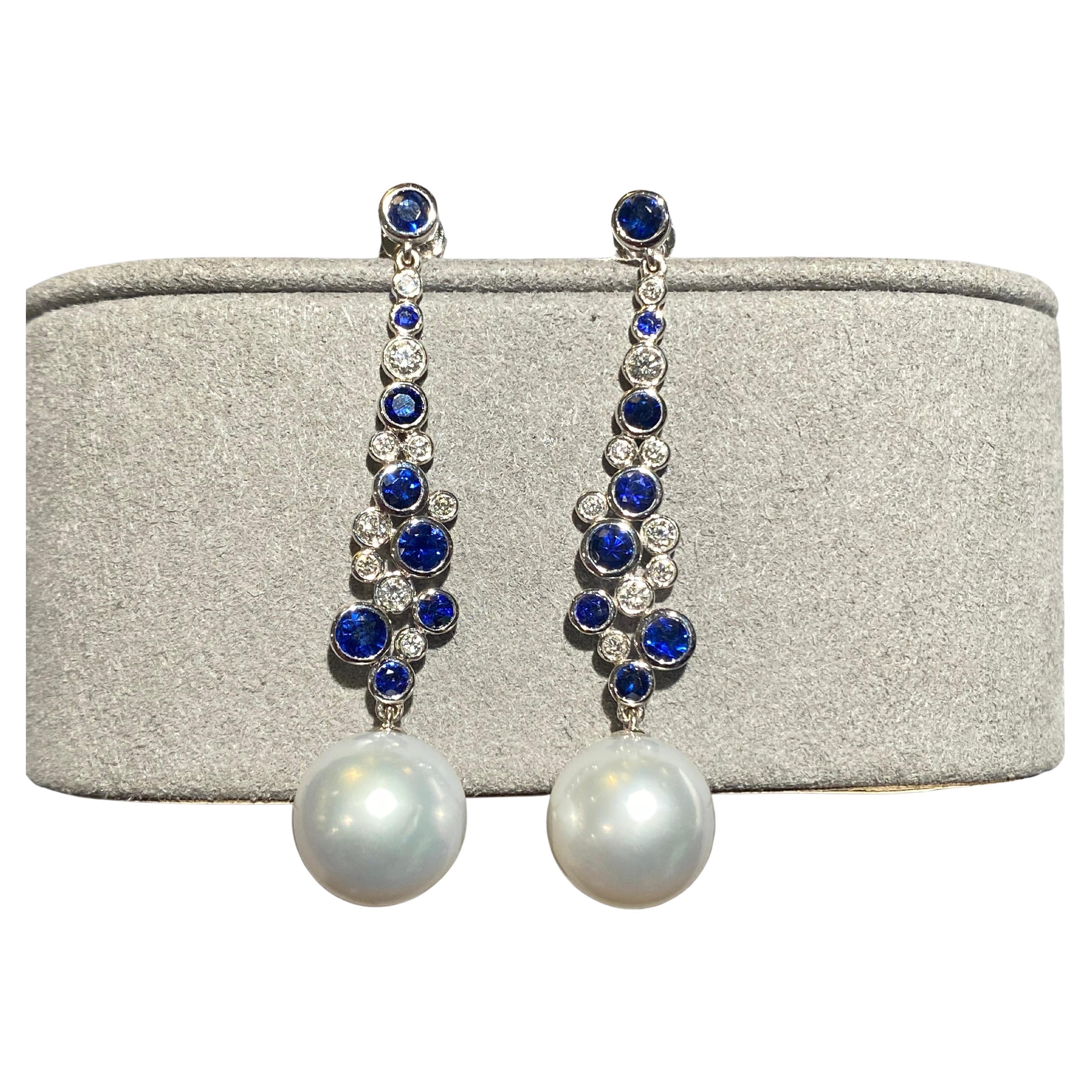 Eostre Blue Sapphire and Diamond Earrings in 18k White Gold For Sale