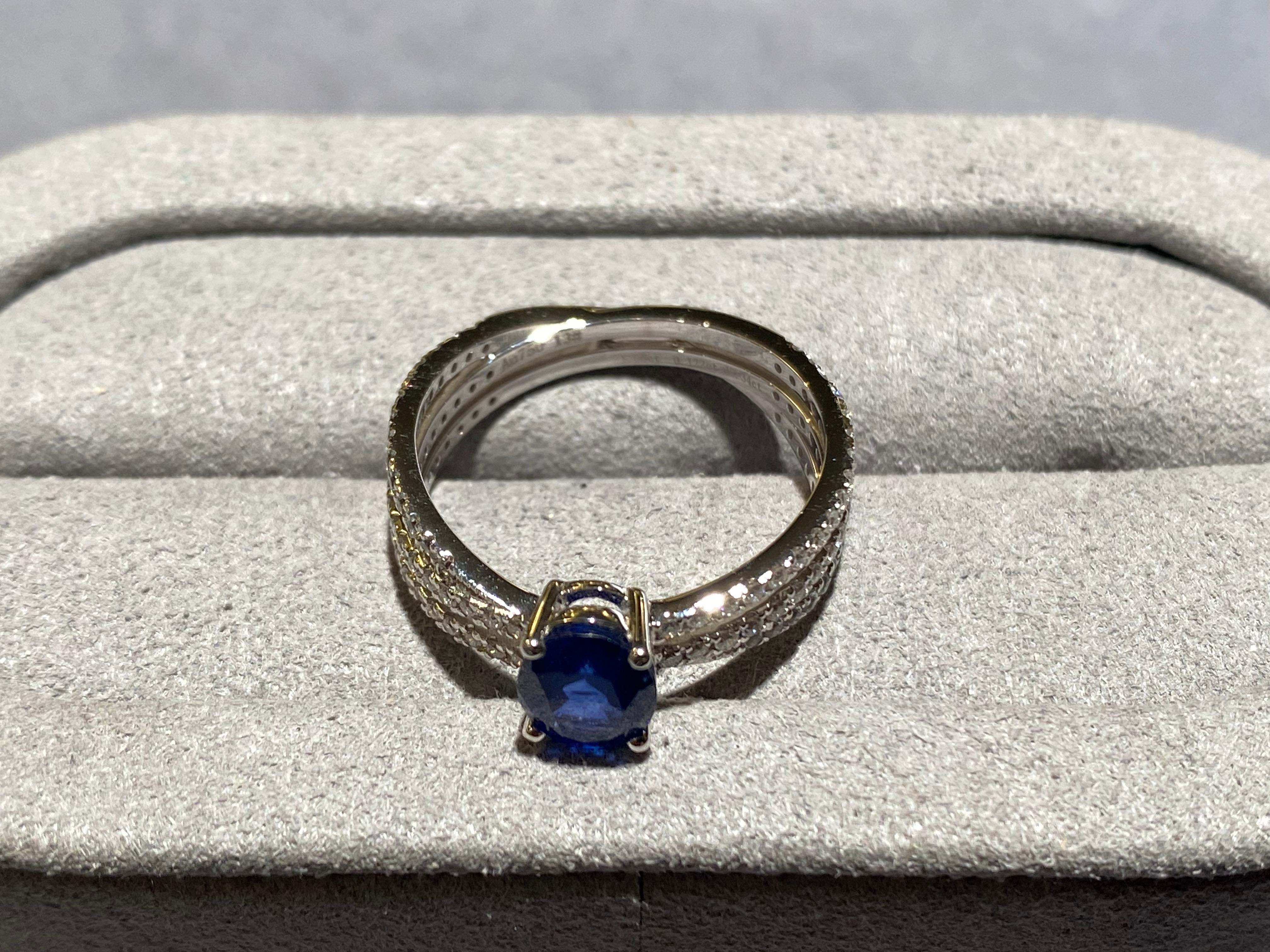 Contemporary Eostre Blue Sapphire and Diamond Ring in 18k white Gold For Sale