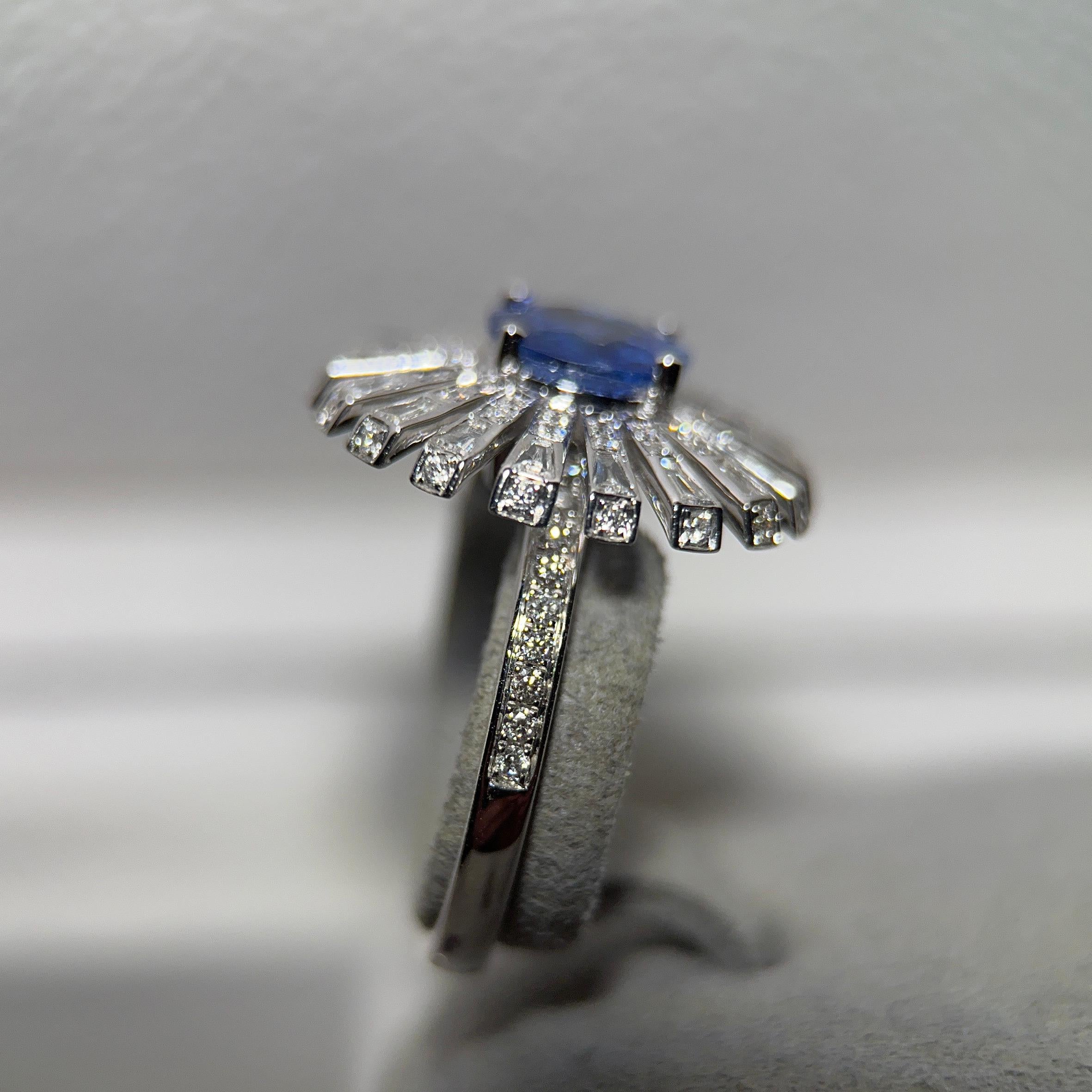 A Blue Sapphire and Diamond Ring in 18k White Gold. The main vivid blue sapphire is secured by 4 white gold claws and the band of the ring is made up of 1 lines of diamond pave.

US Ring Size 6.25
The weight of the main sapphire is 1.66 ct
Total