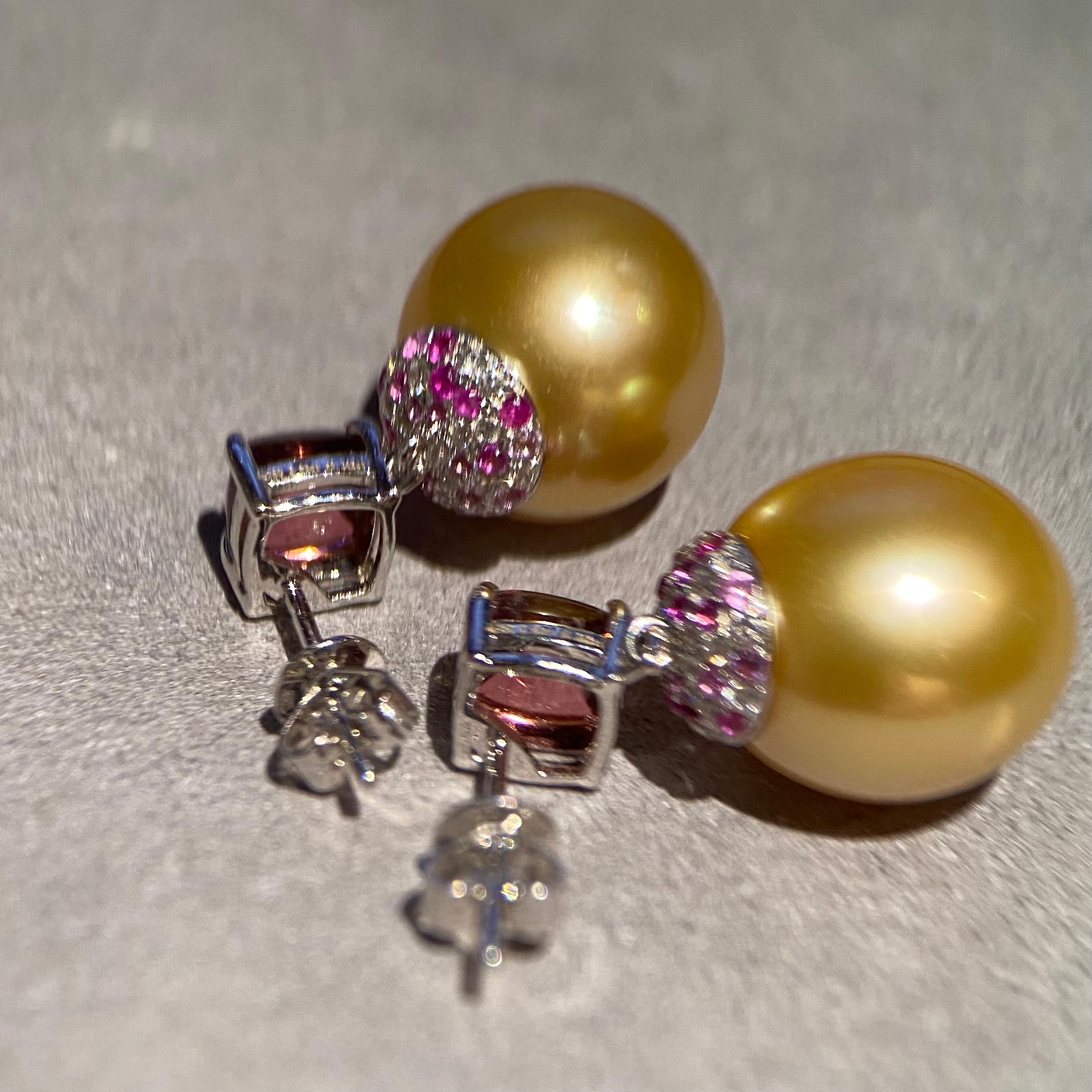 This is a pair of dangle earring with Golden South Sea Pearls suspending below the sugarloaf Rubilite. The design of the earring is a very simple yet popular design. It consists of 2 major components, one is the Ear Stud main stone motif and the