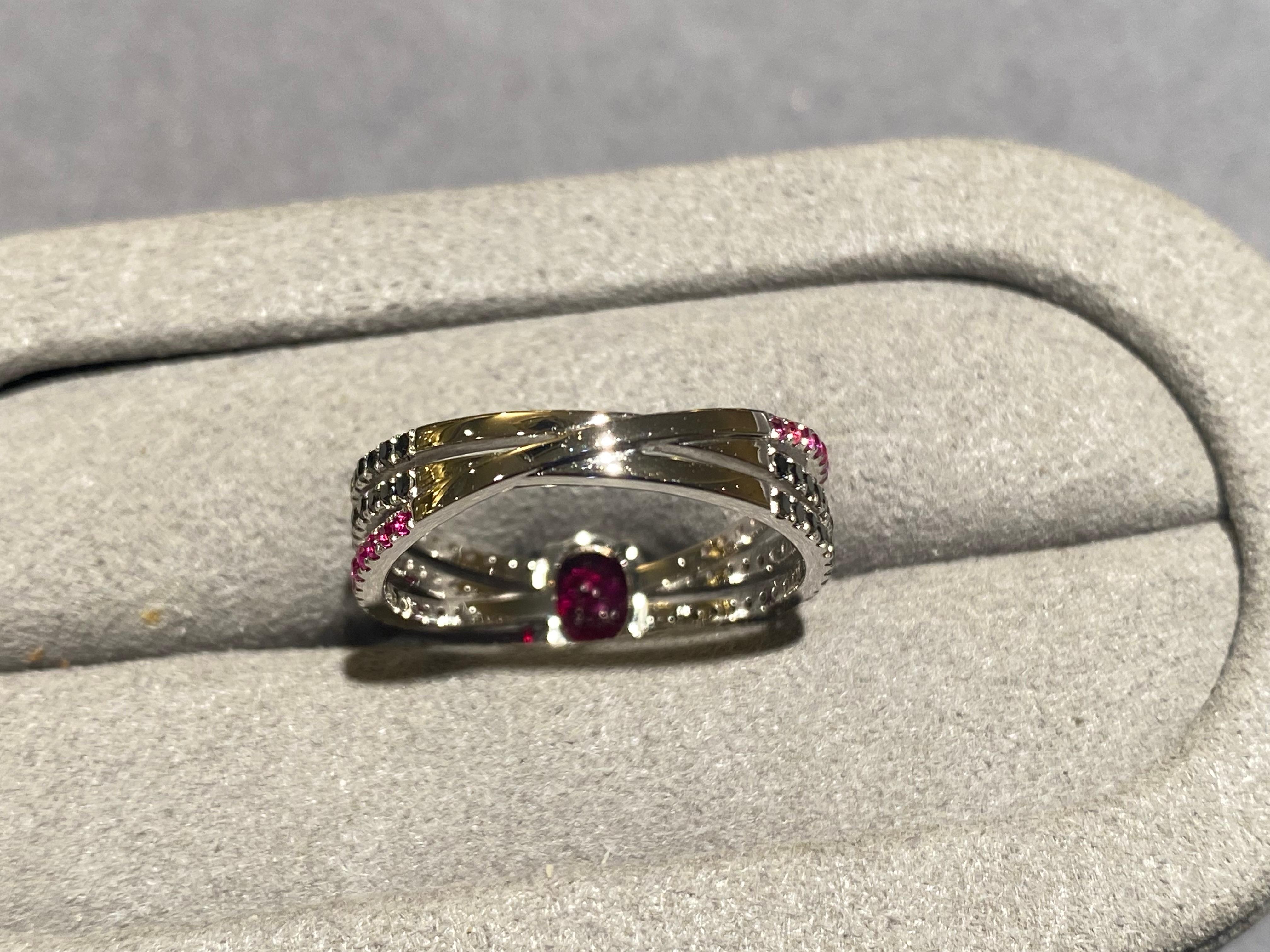 Contemporary Eostre Ruby and Black Diamond Ring in 18k White Gold For Sale