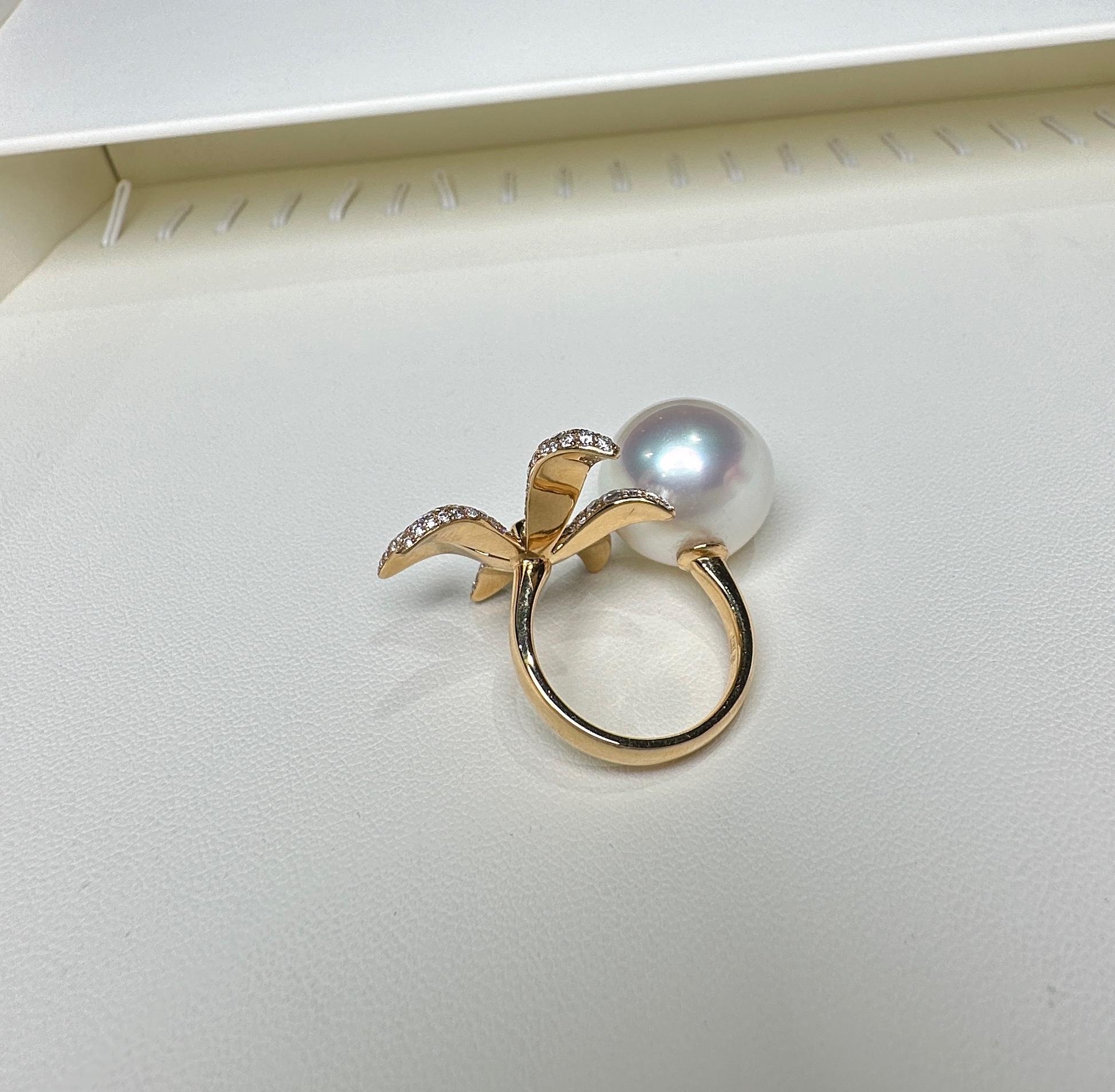 Eostre South Sea Pearl  and Diamond Ring in 18k White Gold. The pearl  is flawless with very high lustre. The colour is pinky white. 

The South Sea Pearl is  17mm

Total diamond weight is 2.18 ct
The colour of the diamond is approximately E/F with