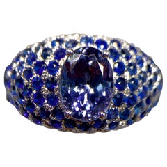 Anello Eostre con tanzanite, zaffiro blu e diamante in oro bianco 18 carati