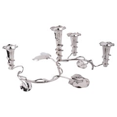 Épergne en métal argenté avec supports à fleurs