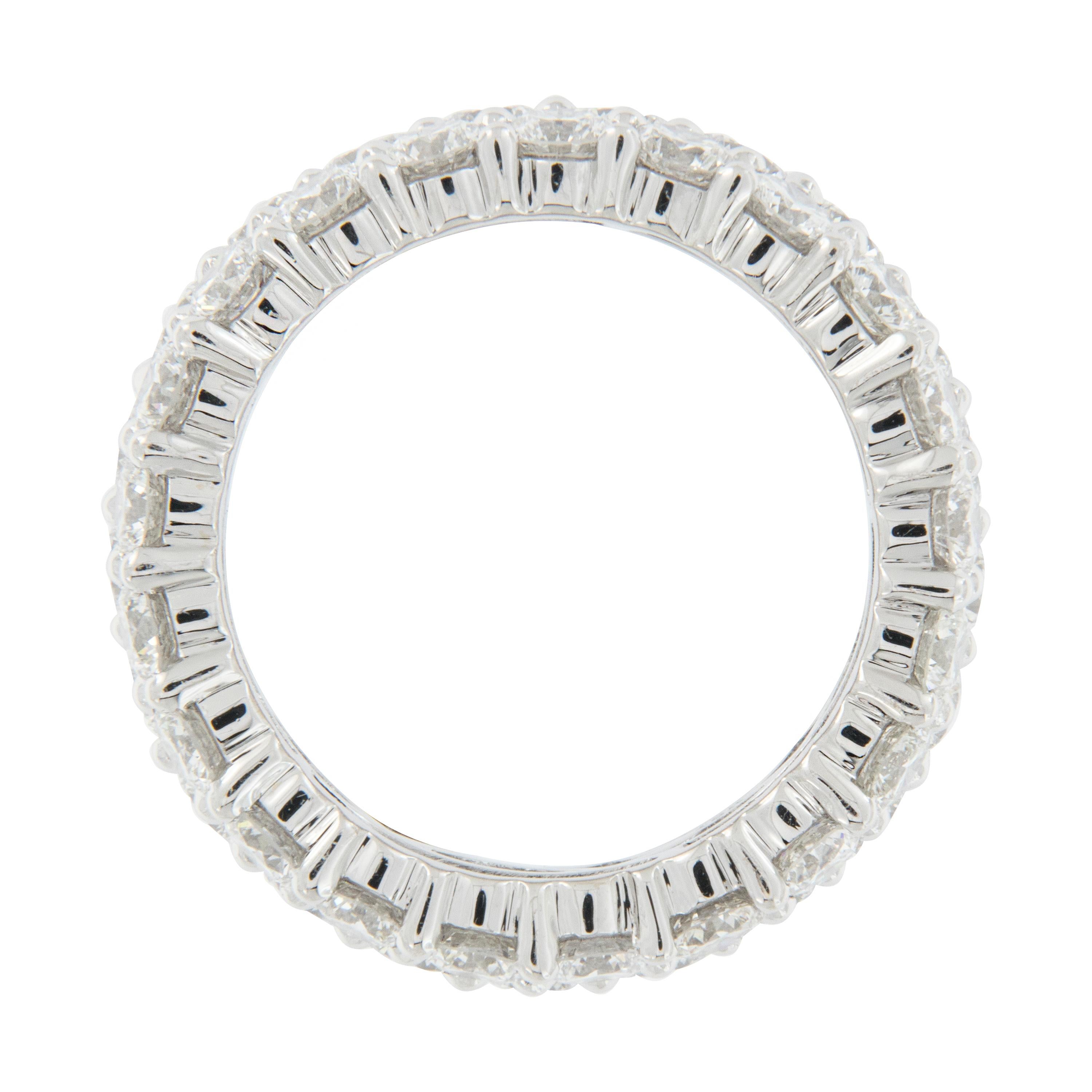 Round Cut Epic 18 Karat White Gold Triple-Row Diamond Ring