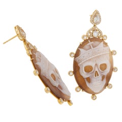 Epic-18 Karat Yellow Gold Conch Shell Skull Cameo Diamond and Sapphire Earrings
