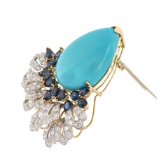 Broche Epic ! en or jaune 18 carats, turquoise, saphir et diamants d'Emis Beros