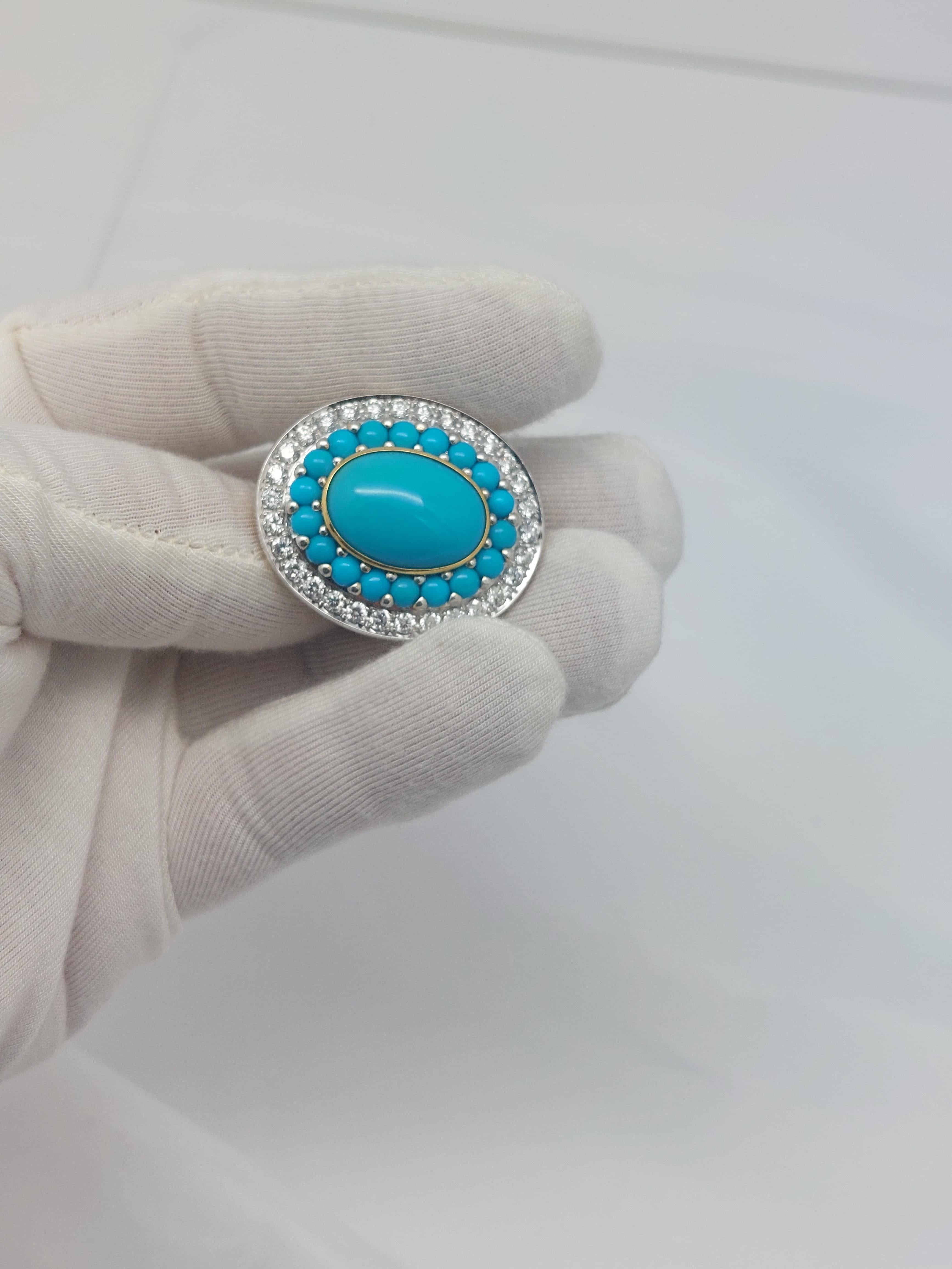 Heirloom-Qualität...................... 
Italienische Handwerkskunst
Ring aus 18 Karat Gelbgold mit exquisitem persischem Türkis
und Diamanten.
Handgravierter Florentine-Finish-Schaft und Unterseite oben.
Oberseite des Rings misst  1  1/4 