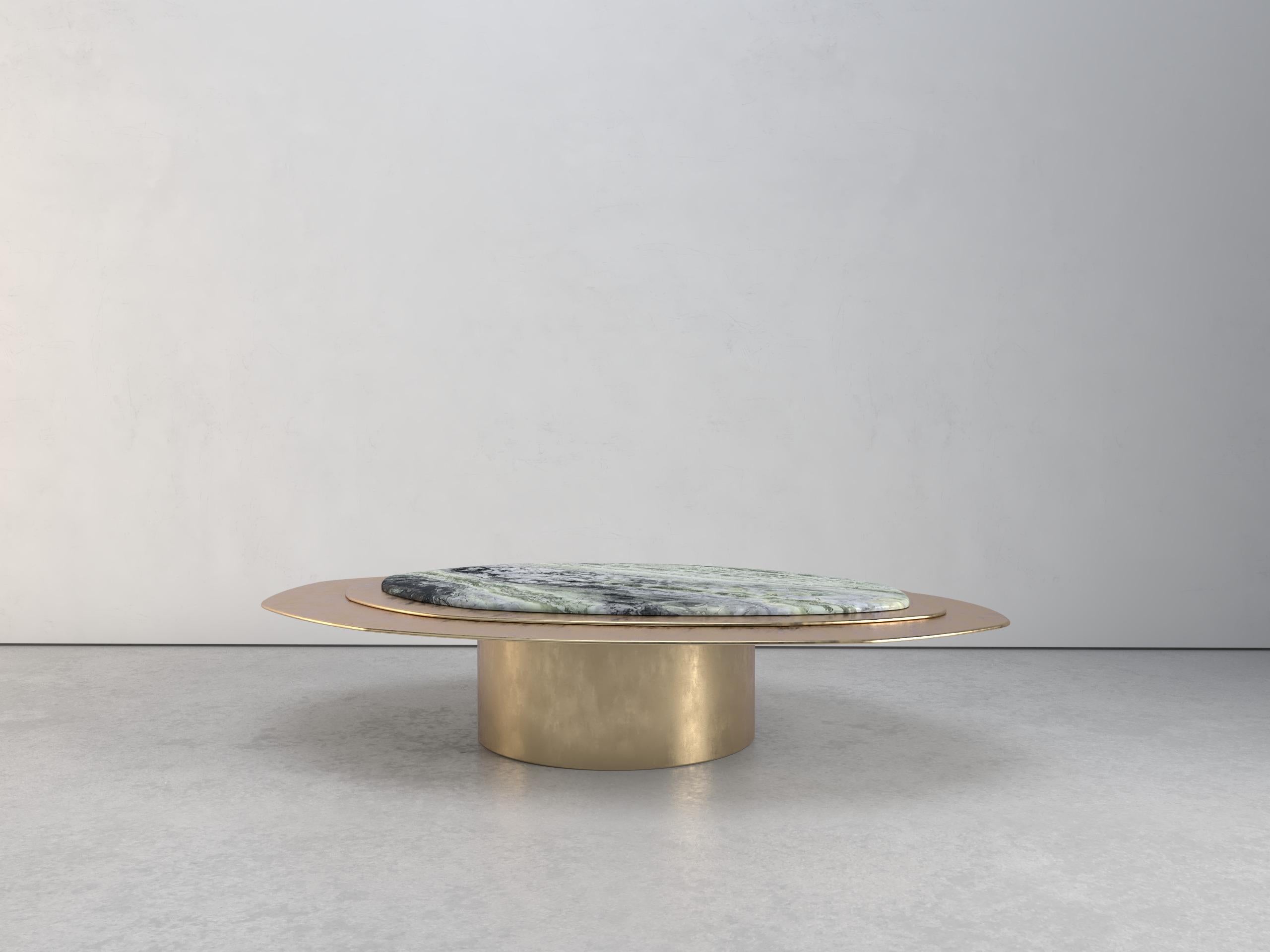 Epicure IX Jade River Marble Limited Edition Coffee Table by Grzegorz Majka
Limited Edition Of 8 Pieces. 
Dimensions: D 125 x W 175 x H 35,5 cm.
Materials: Jade River marble and solid brass.

Luxury doesn’t always follow the common patterns. Luxury