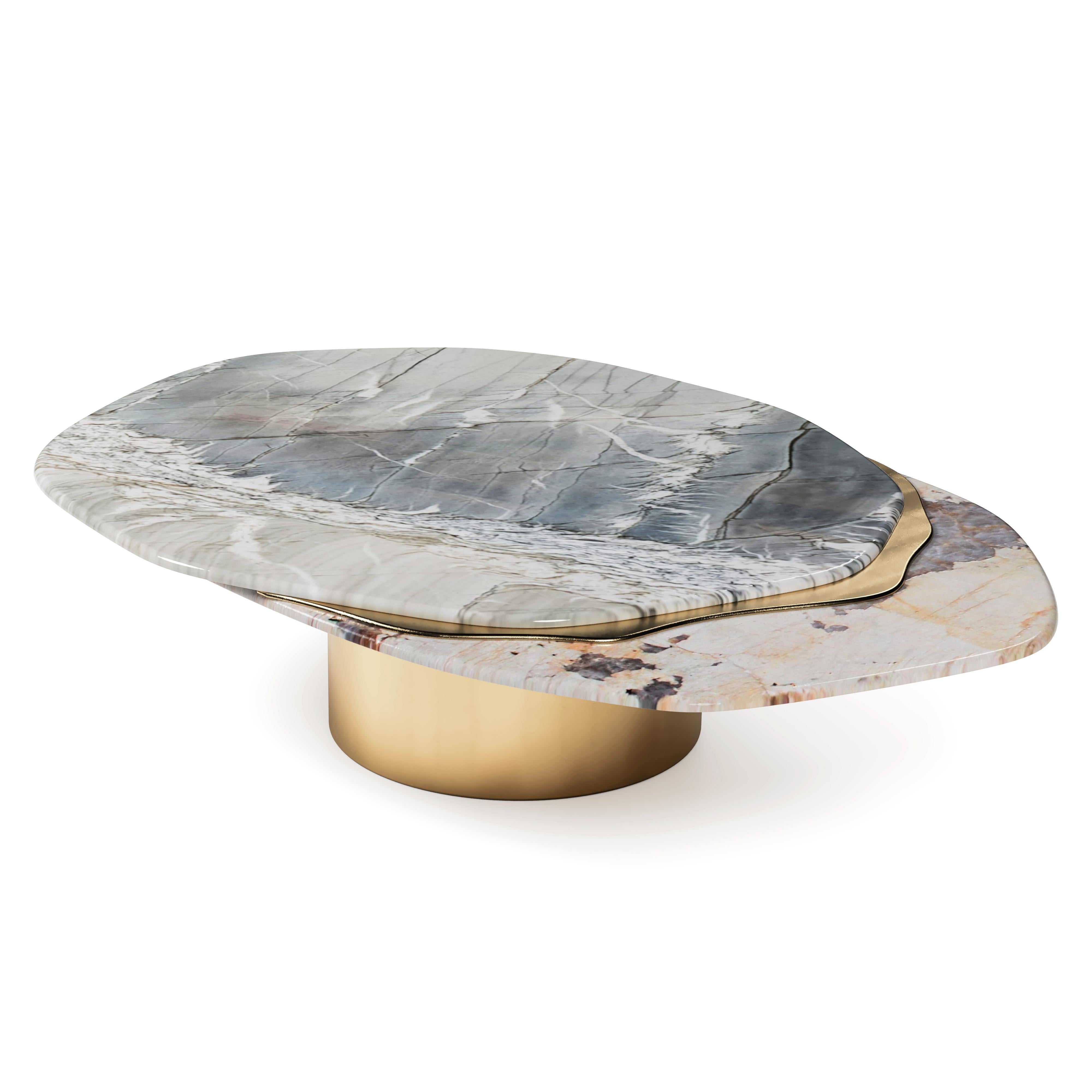“The Epicure V” Contemporary Center Coffee Table ft natural quartzities Venom, Patagonia and solid Brass in “Satin” finish.

Luxury doesn’t always follow the common patterns. Luxury goes beyond and almost like one of the best gourmets joins varied