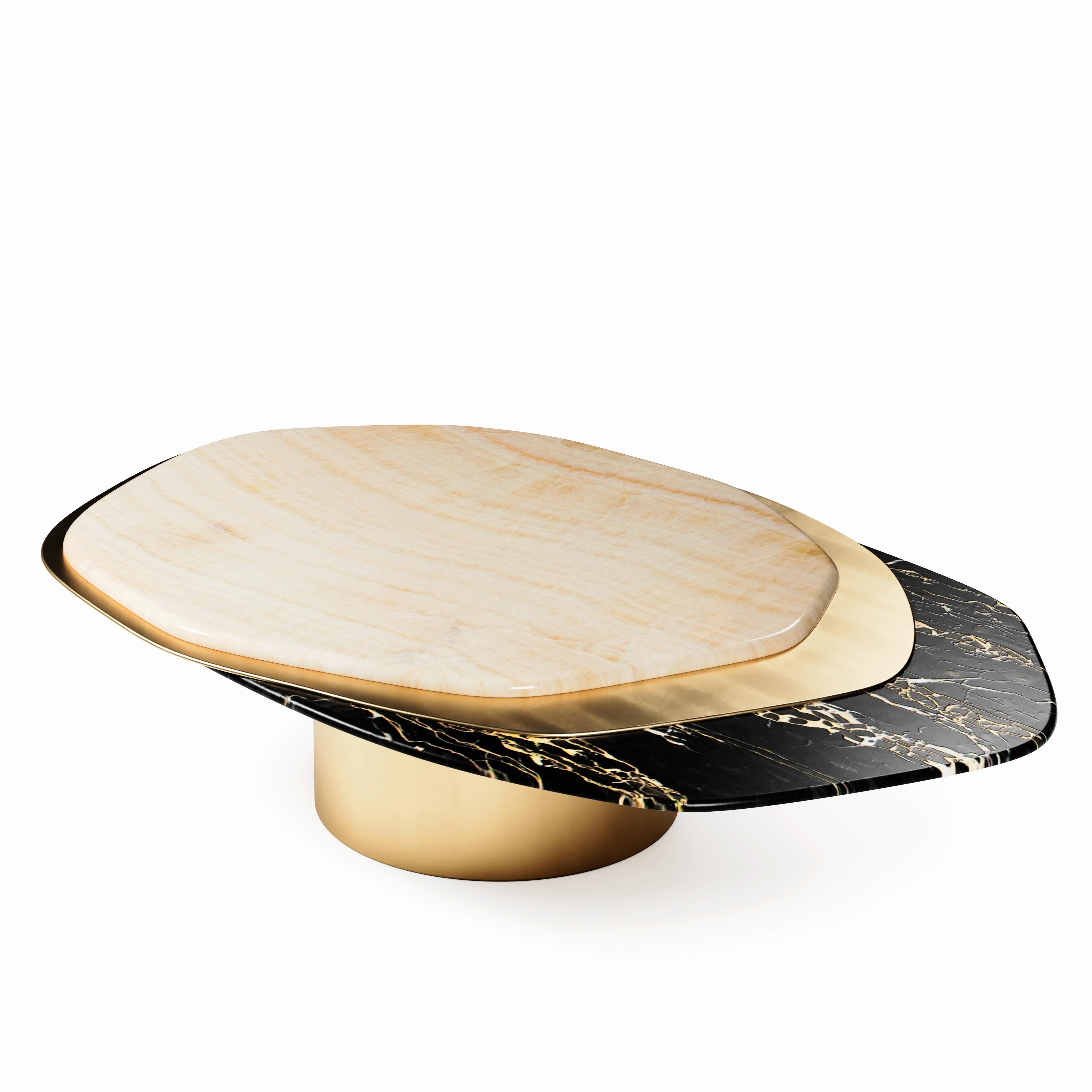 “The Epicure VI” Contemporary Center Coffee Table ft Nero Portoro Marble, Ivory Onyx and solid Brass in “Satin” finish.

Luxury doesn’t always follow the common patterns. Luxury goes beyond and almost like one of the best gourmets joins varied