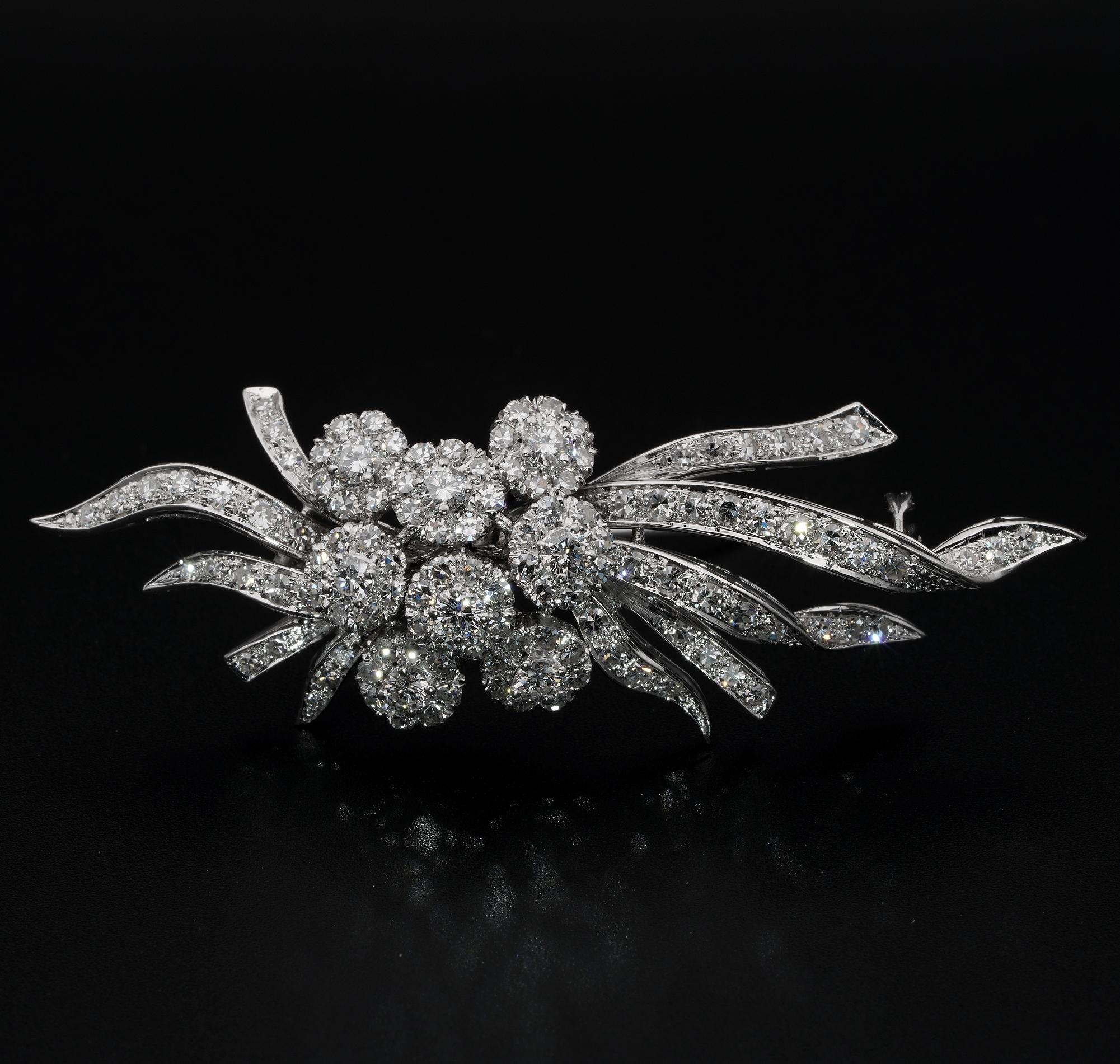 Epitome of Elegance

This outstanding mid century brooch is best example of the tasteful glamour design of the period
Superbly hand created of solid 18 KT white gold, truly exquisite in details -assay and maker marks
Consists of a remarkable rich