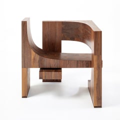 Epoca sculptural armchair in solid walnut hand made in Italy