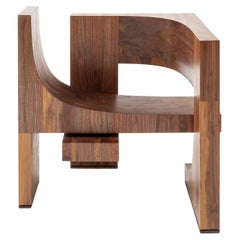 Epoca sculptural armchair in solid walnut hand made in Italy