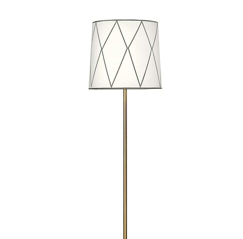 Part of the Epoque collection including lighting fixtures that combine modern design with classic sophistication, the antique-finished brass structure of this floor lamp has a trumpet shape with a slim stem. The white fabric shade is accented with a